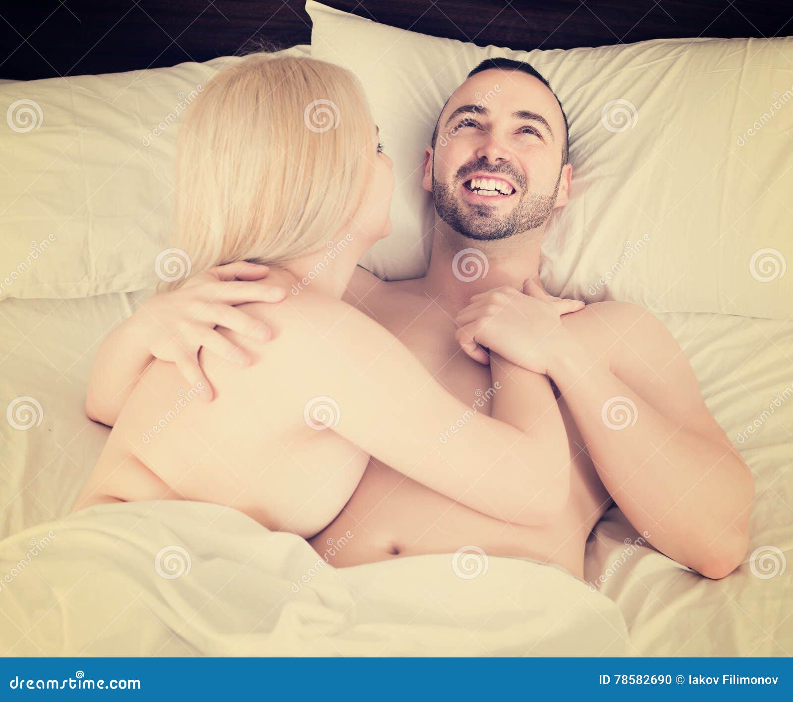 Couple having sex in bed stock photo picture pic