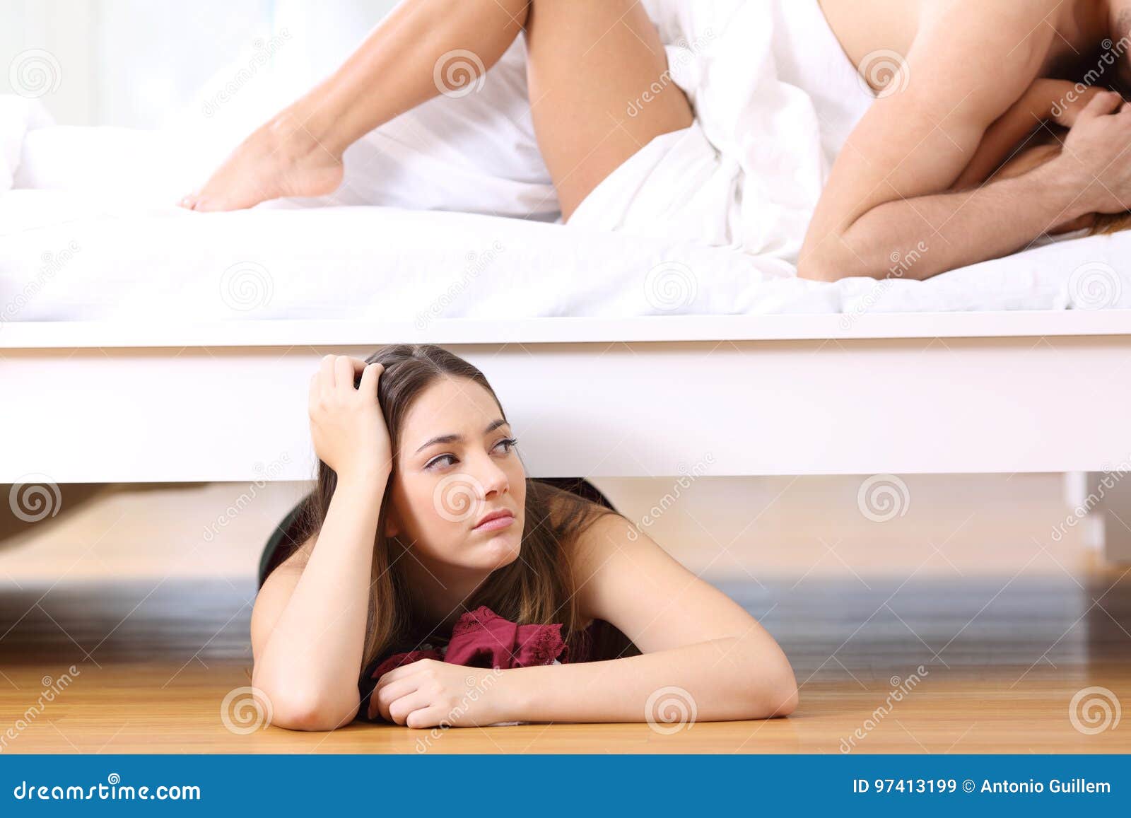 Couple Having Sex with Bored Lover Hidden Stock Image