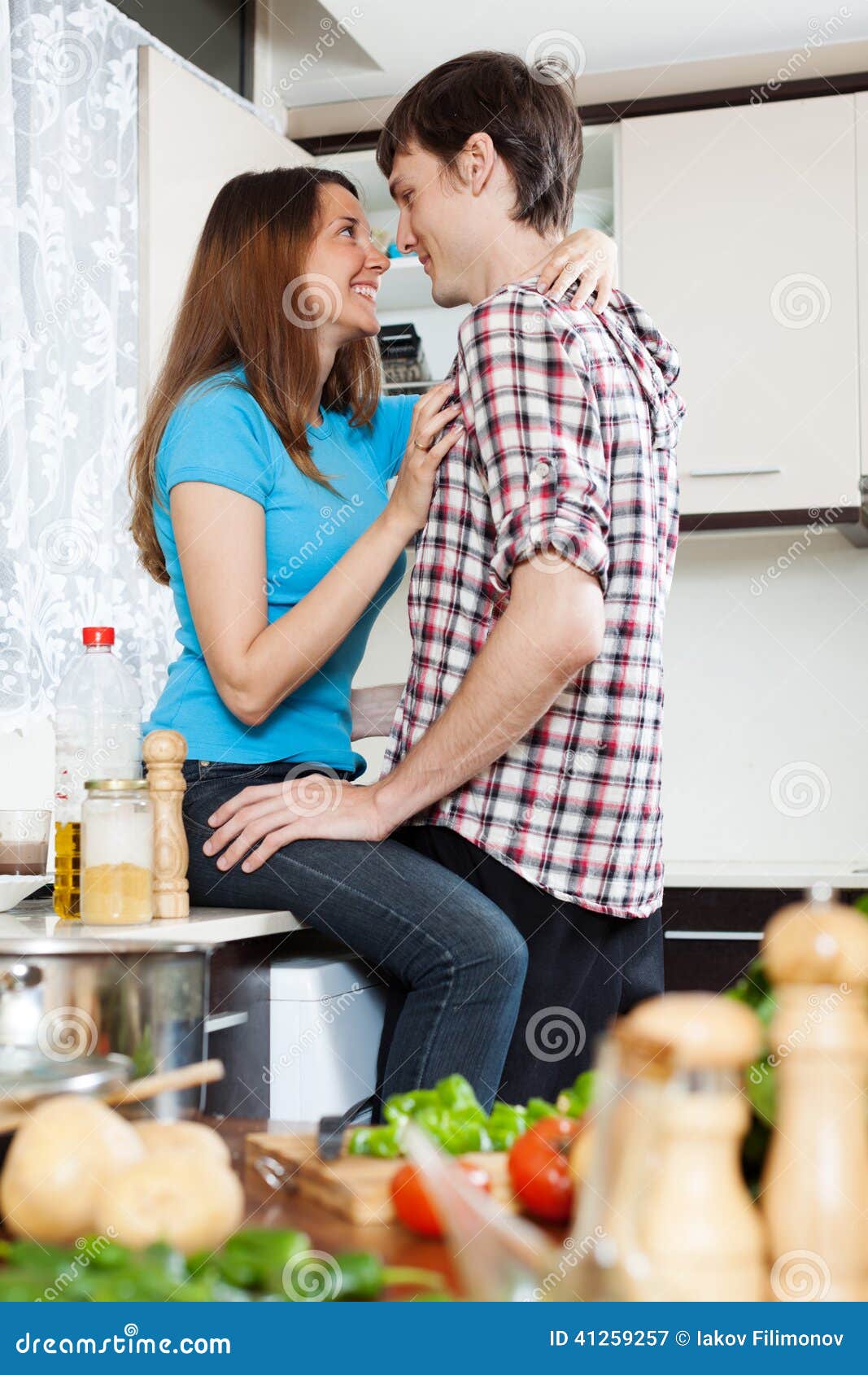Couple Having Sex at Domestic Kitchen Stock Image photo picture