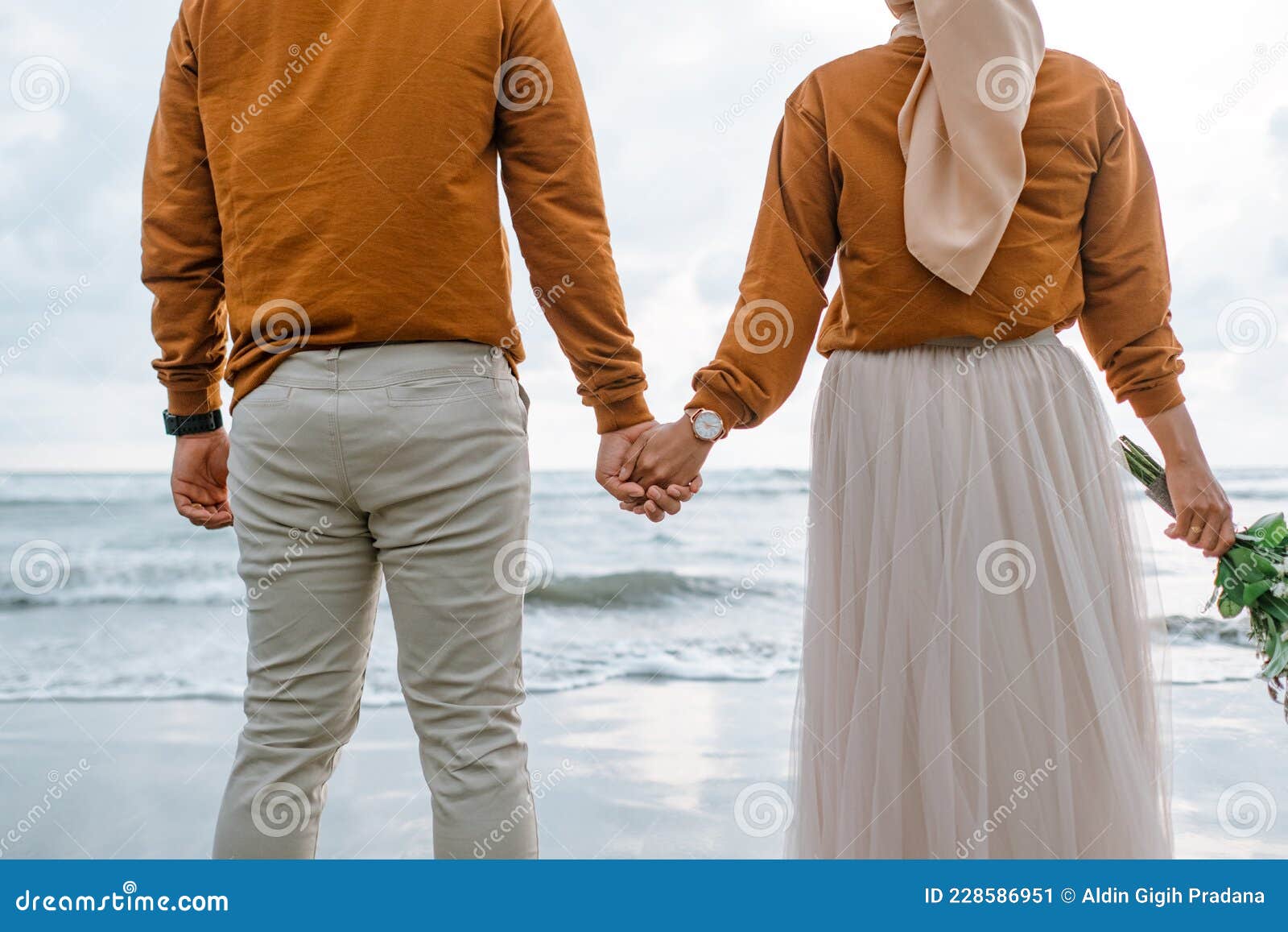 A Couple Holding Hand Together from View from Back Stock Image Image