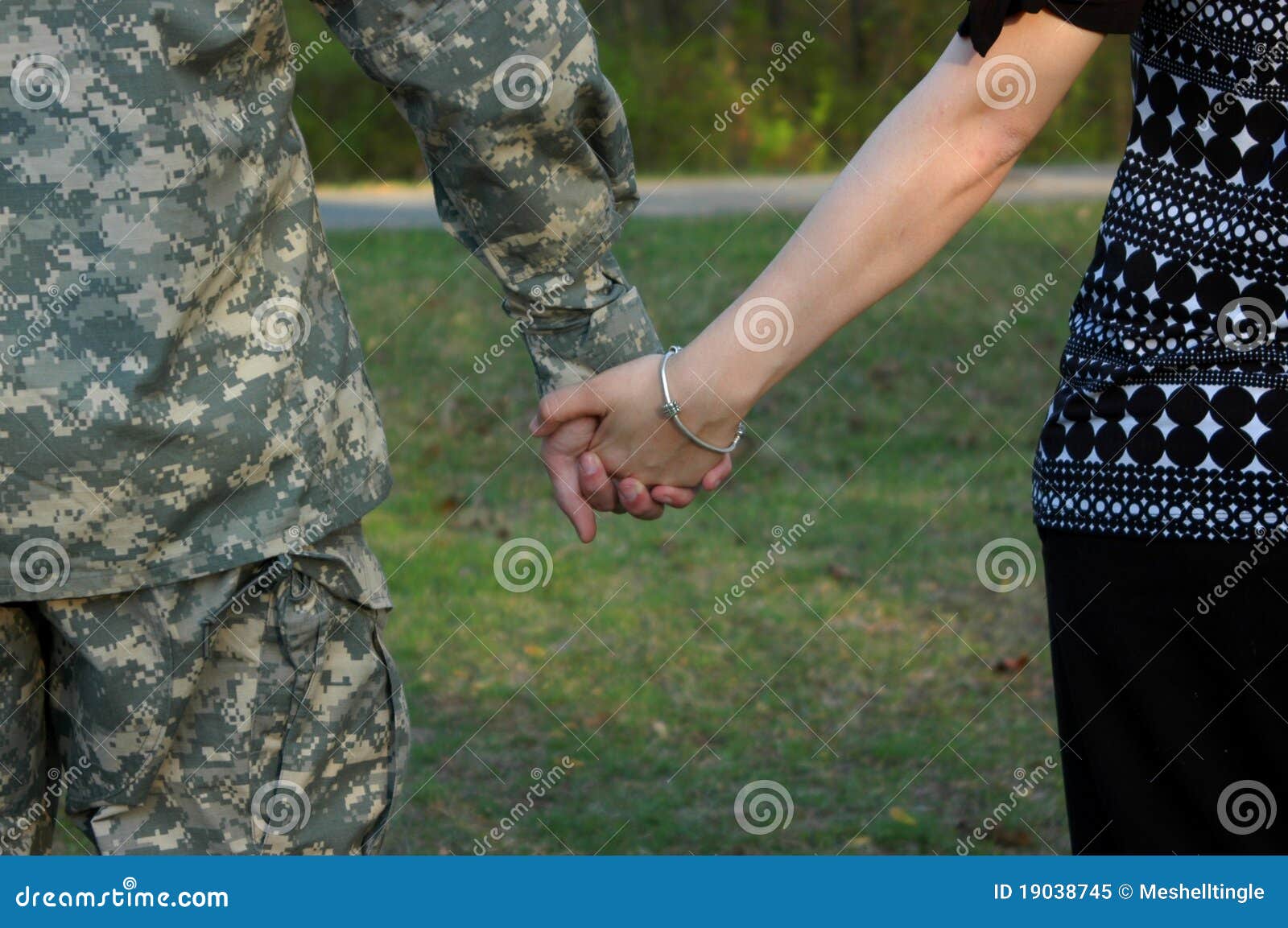 Couple holding hands stock image. Image of military, combat - 19038745