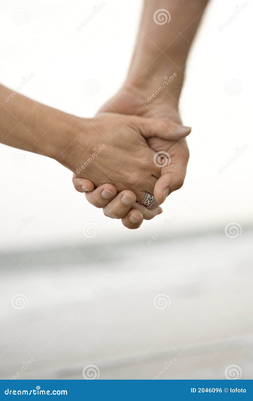 Couple holding hands stock photo. Image of image, shore - 2046096