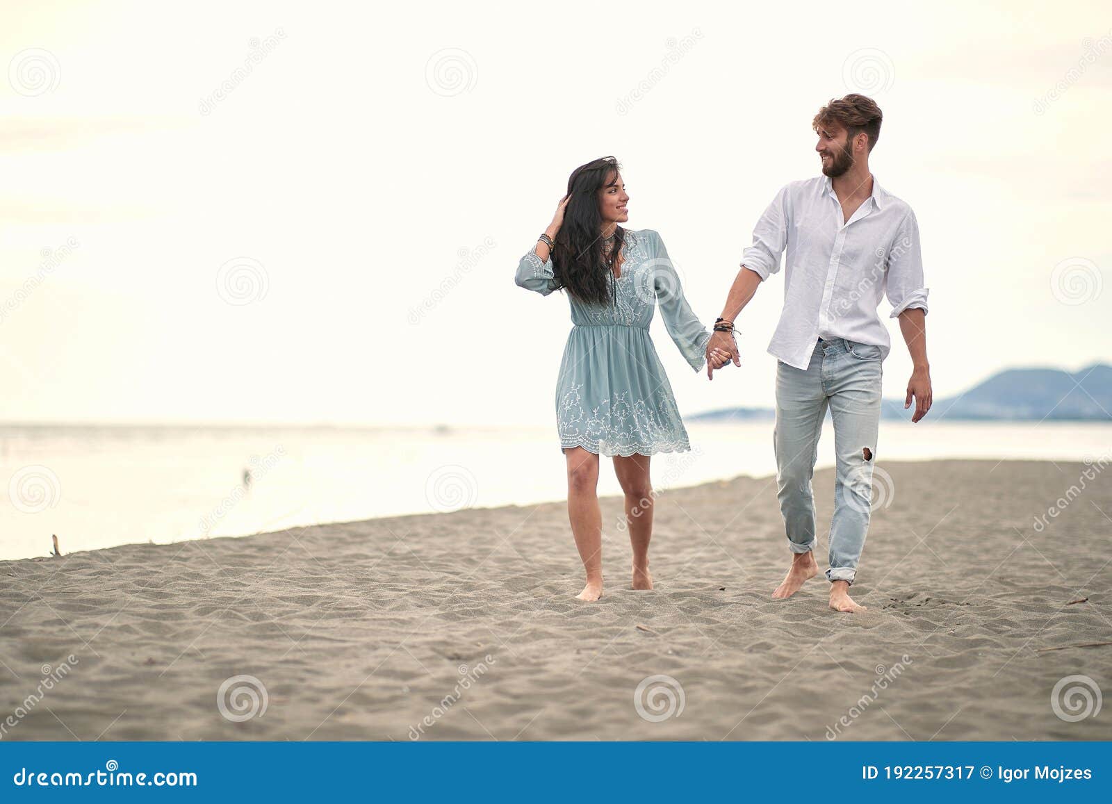 girlfriend and boyfriend holding hands