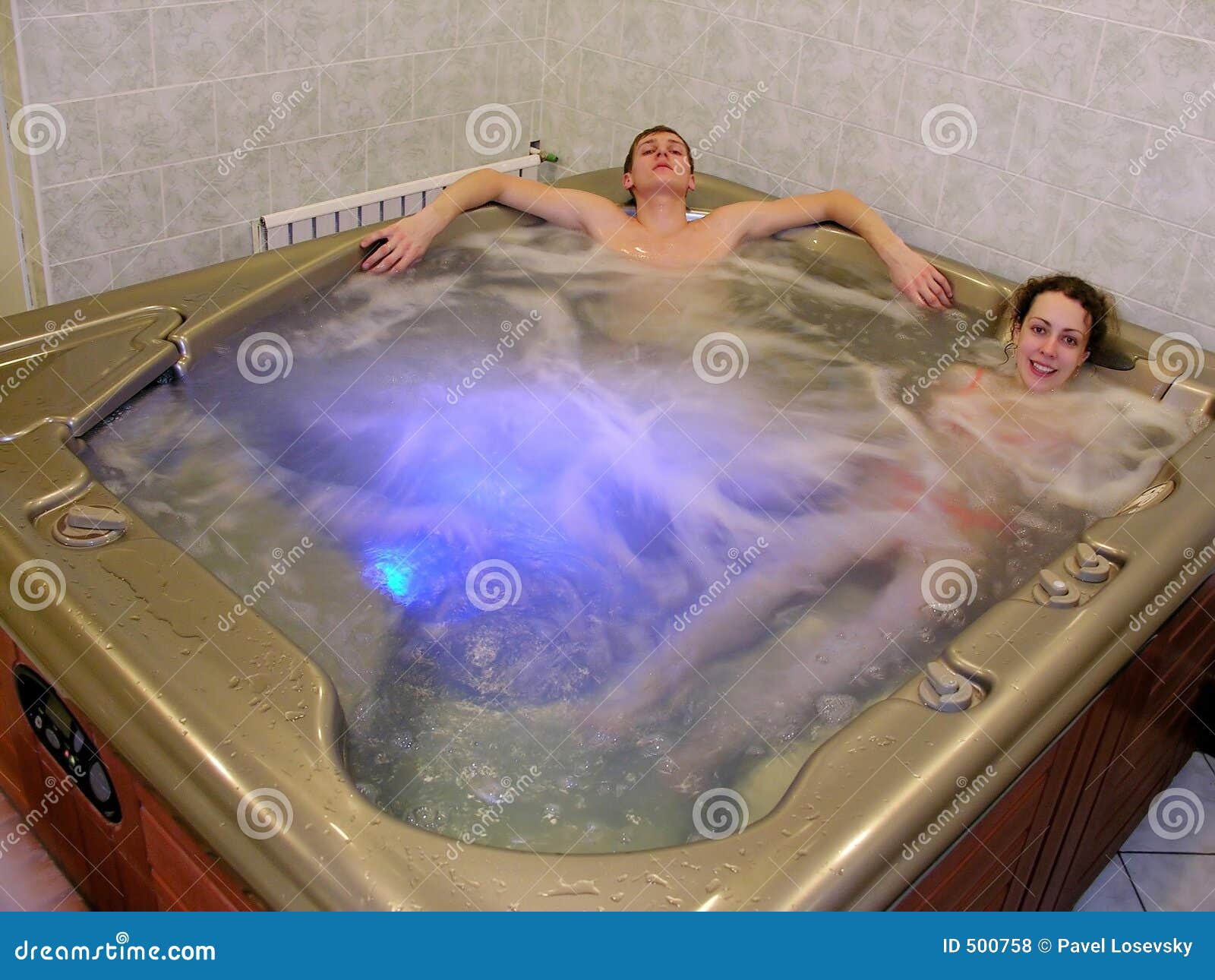 couple and jacuzzi