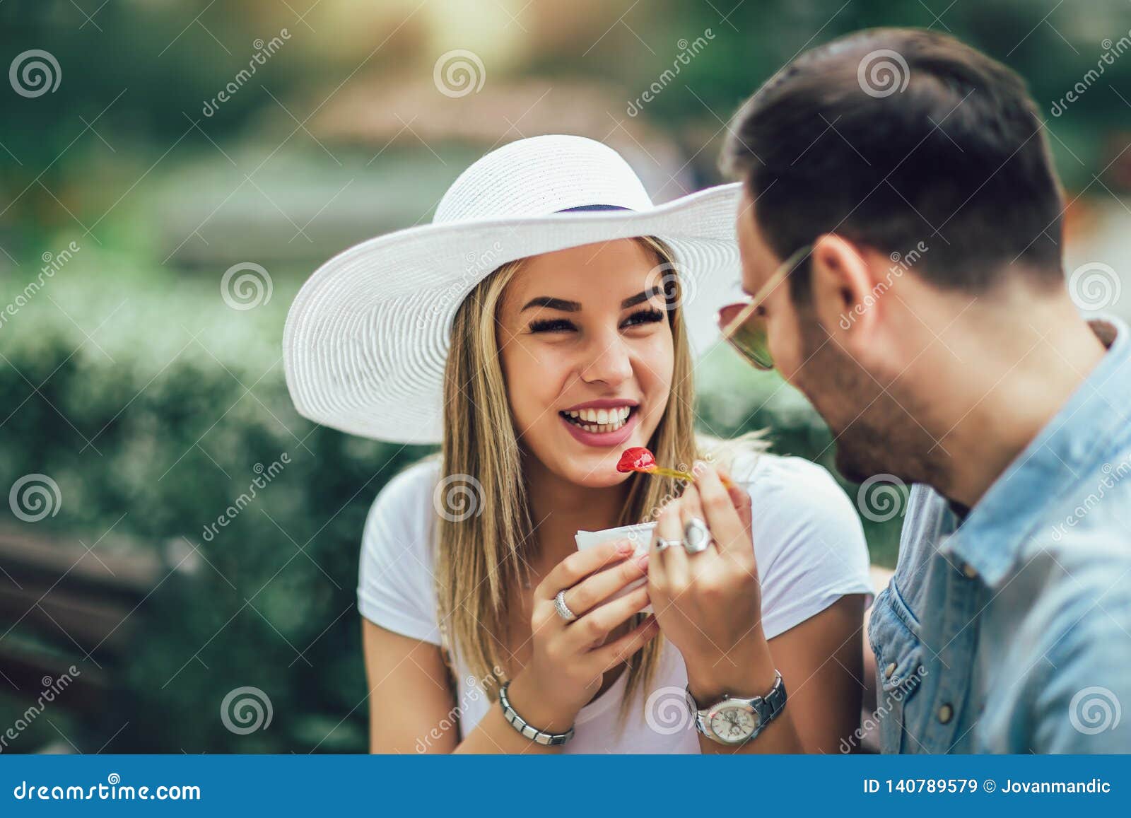 Couple Joking And Having Fun While Eating An Ice Cream Stock Image Image Of Attractive