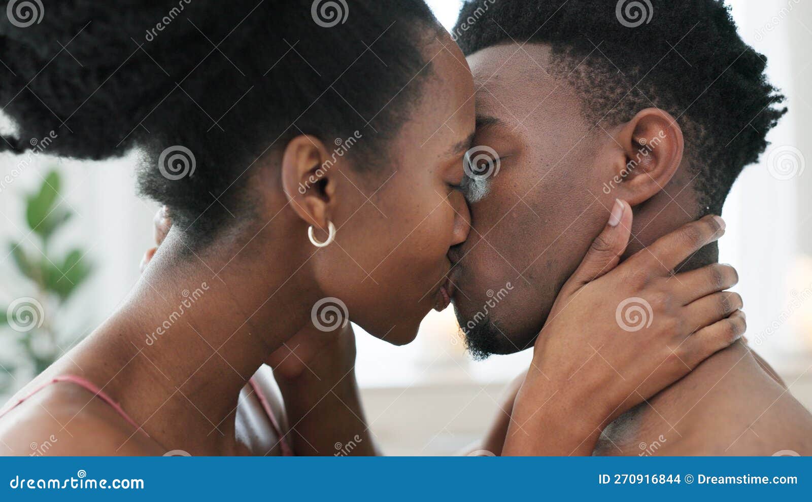 Couple Kiss, Bedroom Sex and Love on Bed in House, Erotic Sexual Energy in Marriage and Nude People Being Sexual Stock Photo