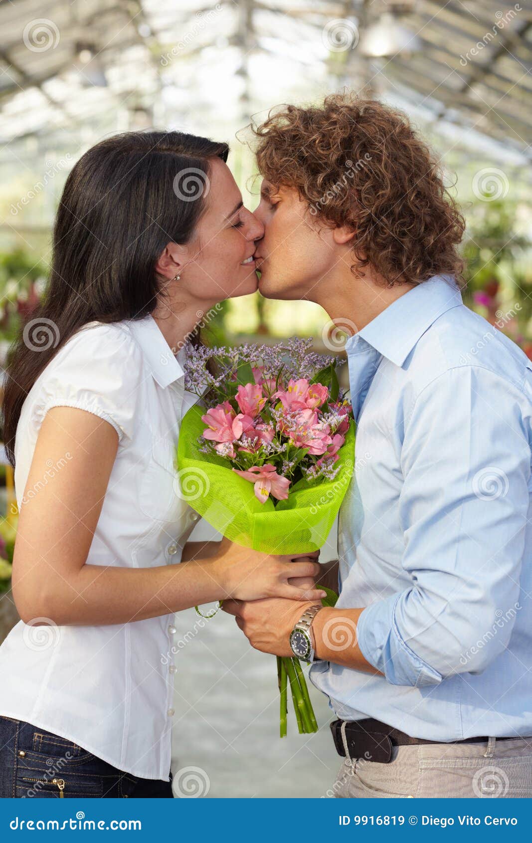 Couple Kissing in Flower Nursery Stock Image Image of nursery, holding 9916819