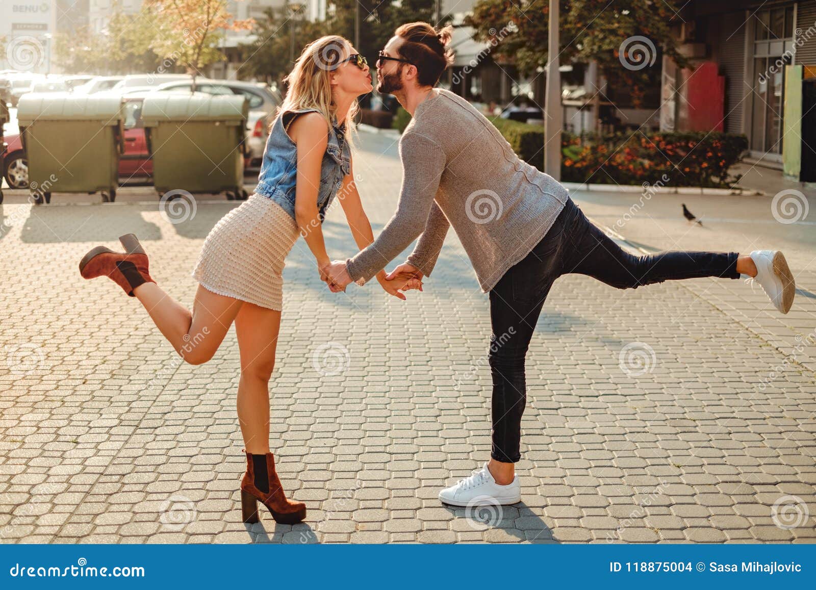 Couple Kissing Funny on the Sidewalk Stock Photo - Image of boyfriend,  dating: 118875004