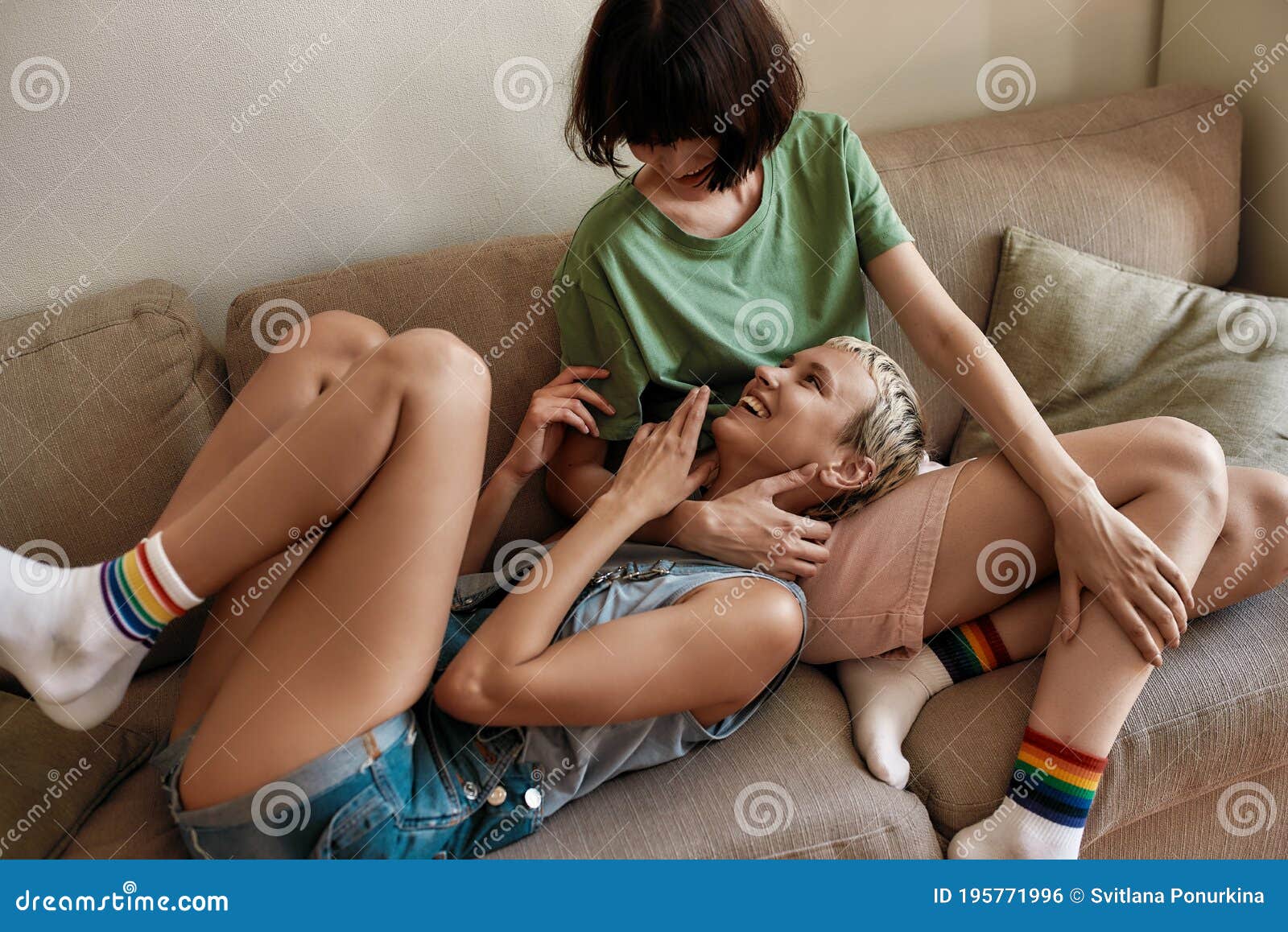 Lesbian Girls Kissing On The Sofa