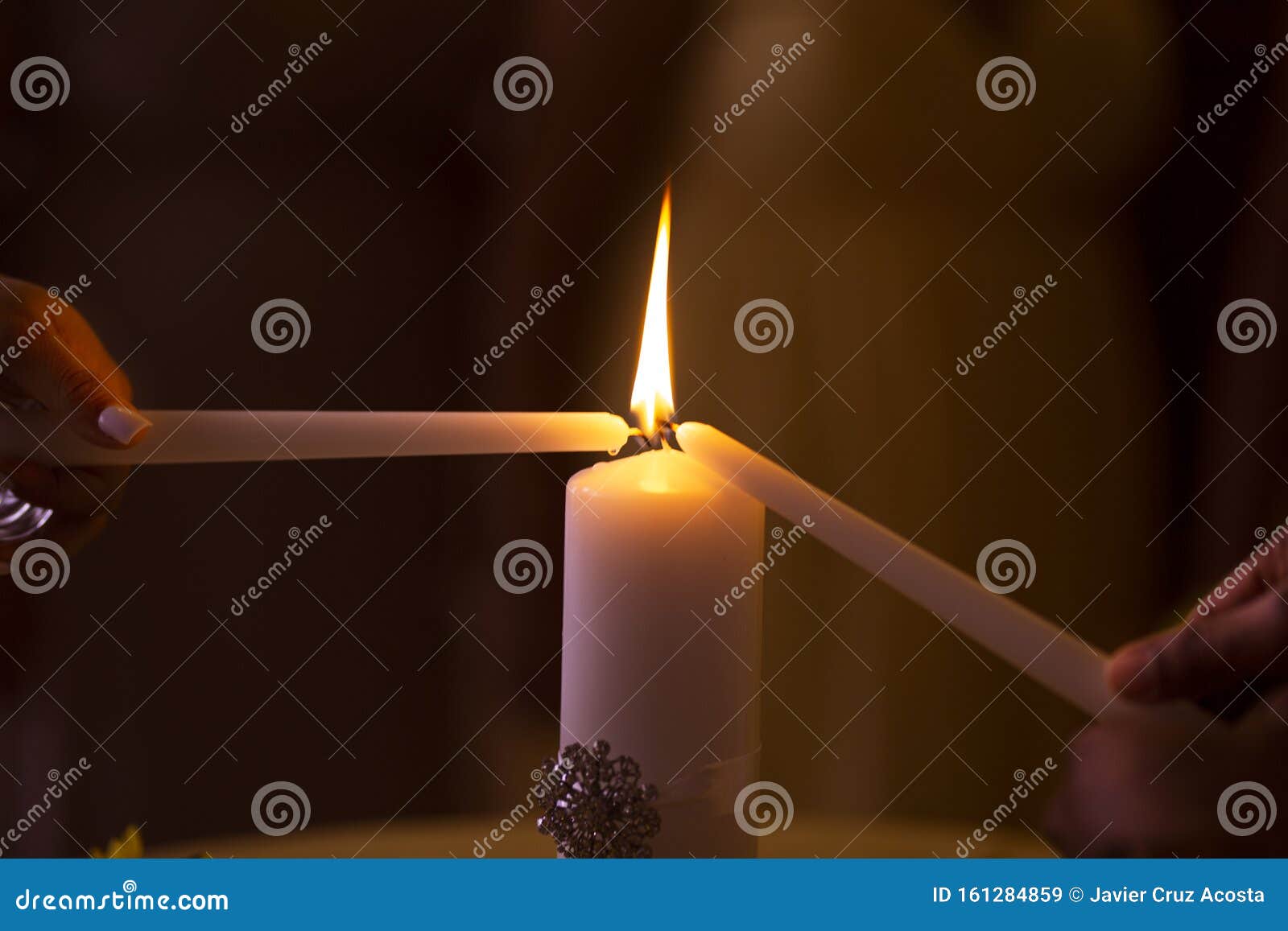 Couple lighting a candle stock image. Image of couple 161284859