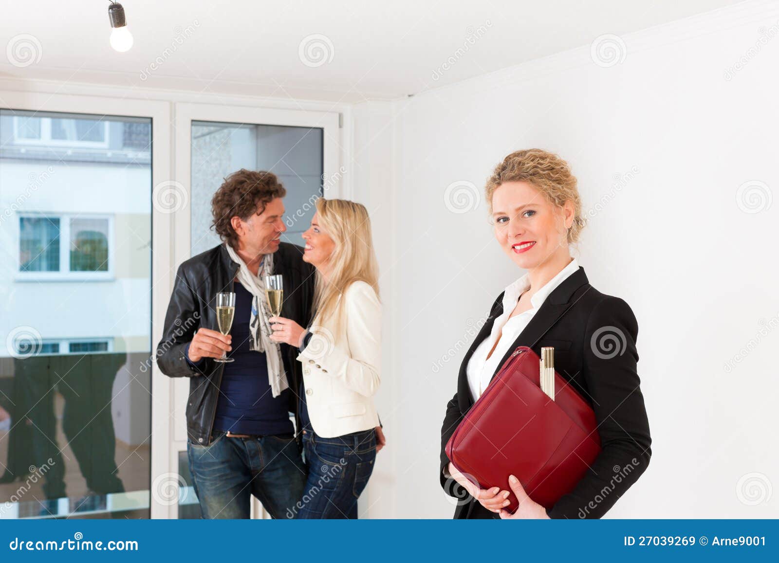 Couple Looking For Real Estate With Female Realtor Stock Image Image 