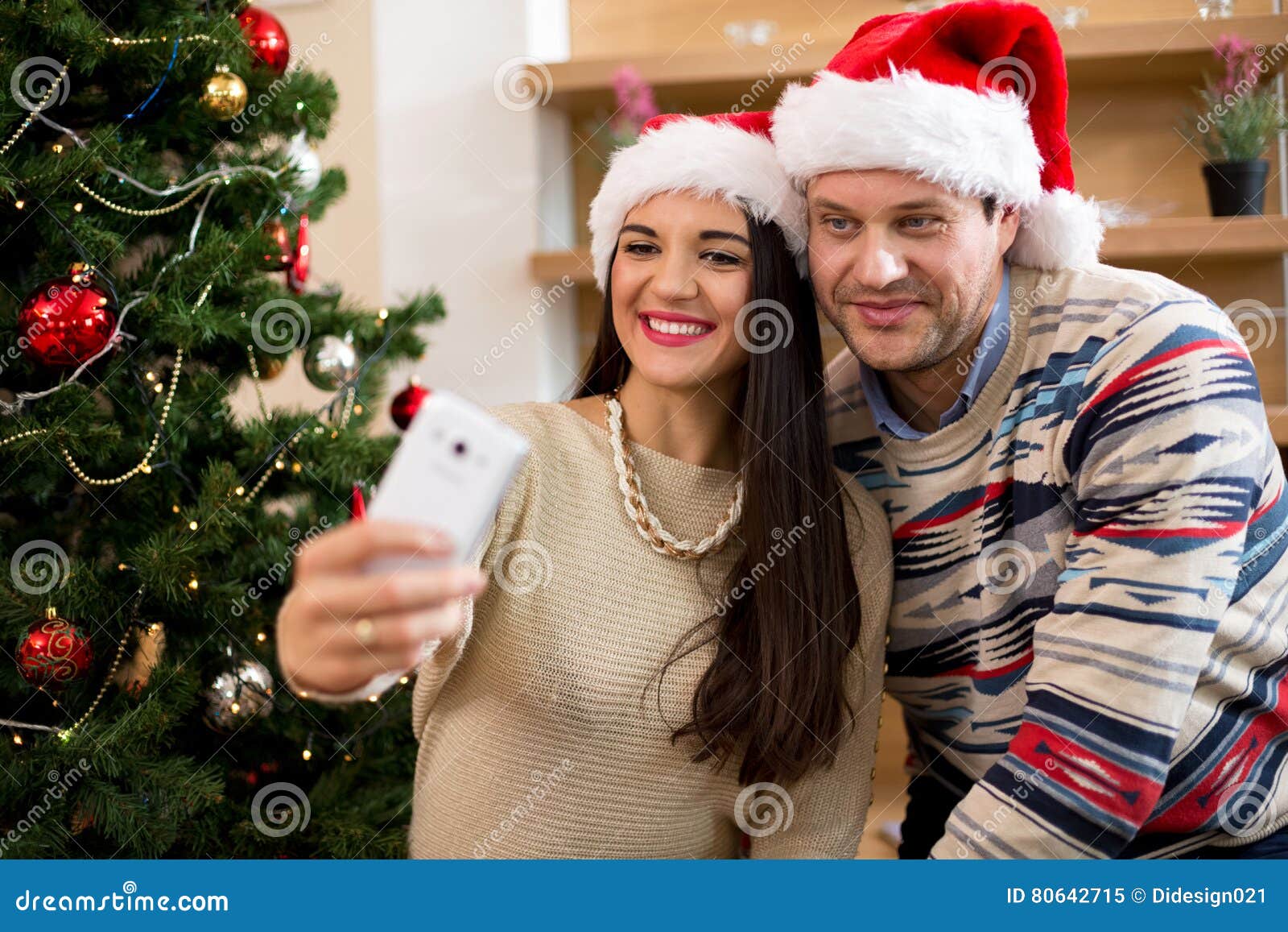 Couple in Love Doing Selfi beside the Christmas Tree Stock Image ...