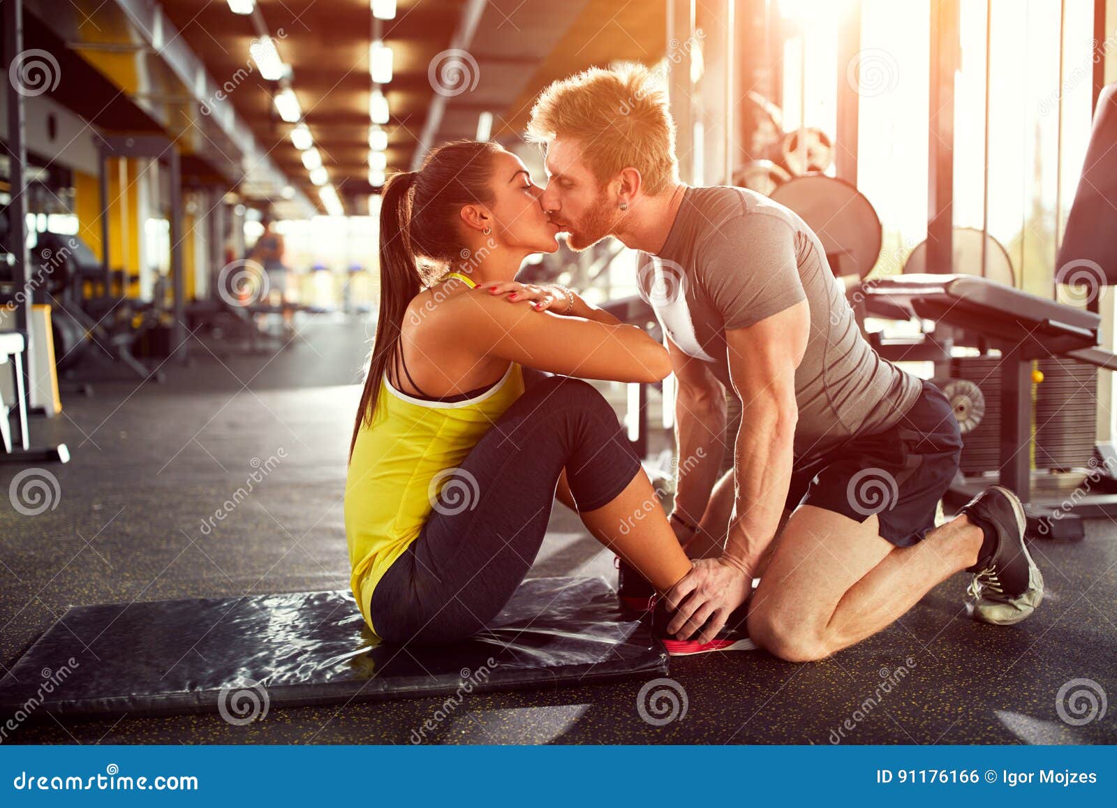Couple in love in gym stock photo. Image of girl, exercise 91176166