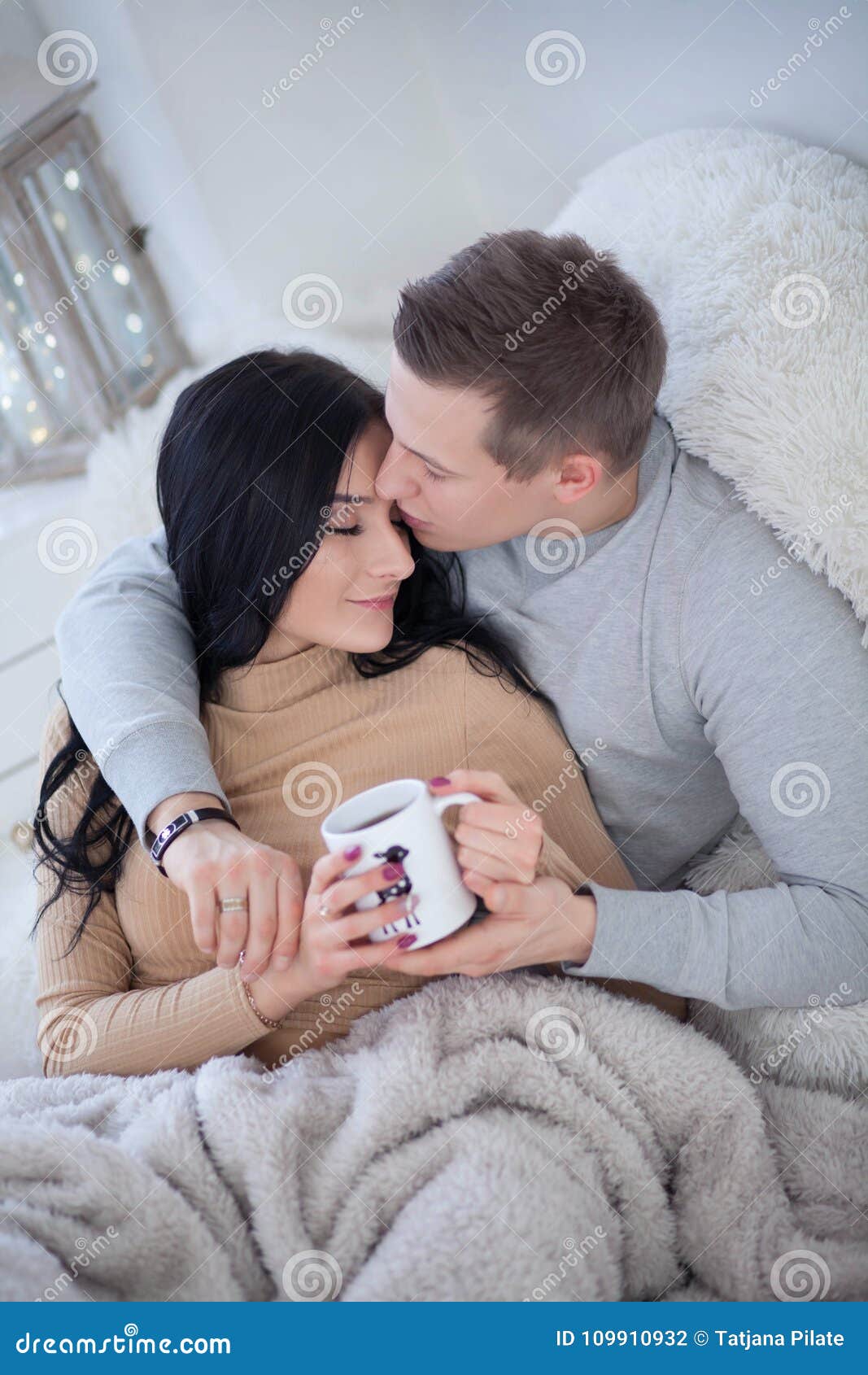 Couple in Love Hugging and Kissing at Home Stock Image - Image of