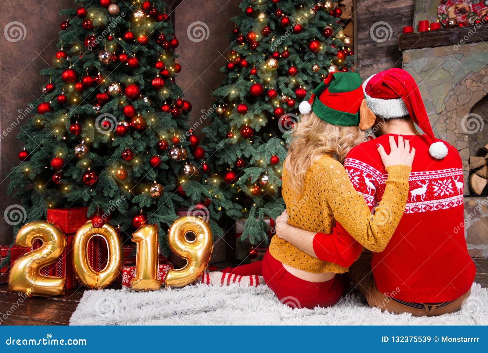 Young Happy Couple in Love during Merry Christmas and Happy New ...