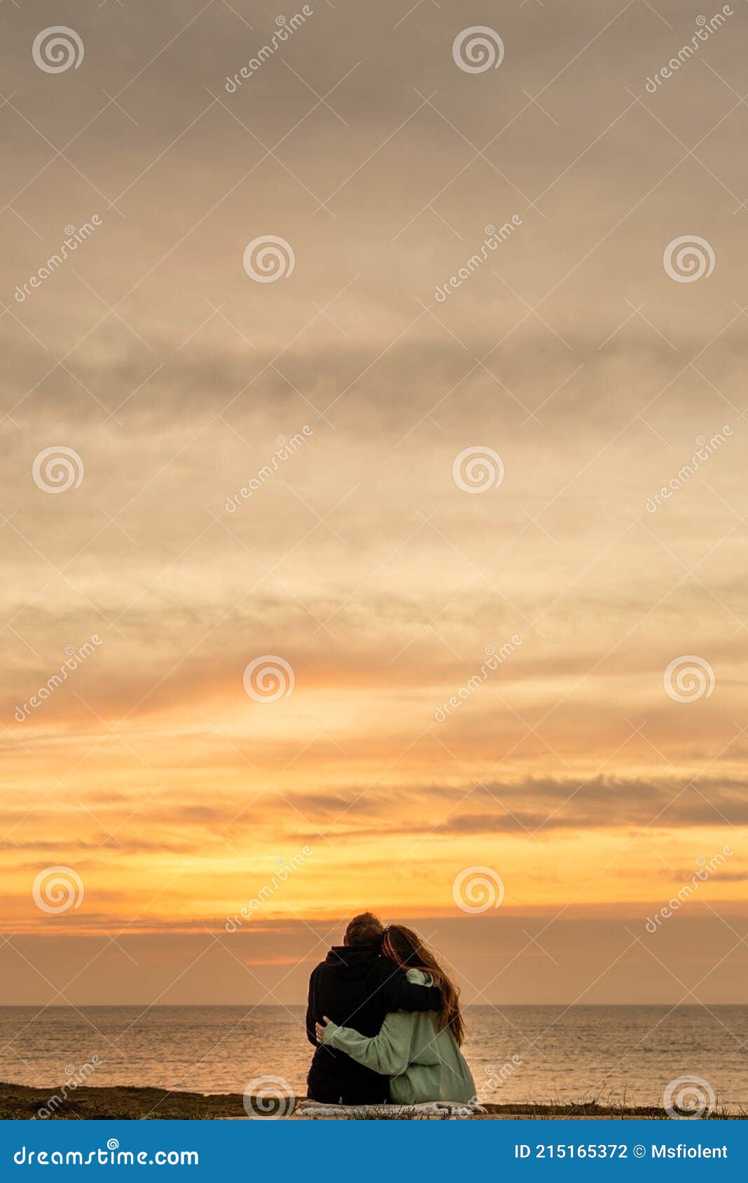 Couple In Love Watching Sunset Together On Beach Travel Summer Holidays People Silhouette From
