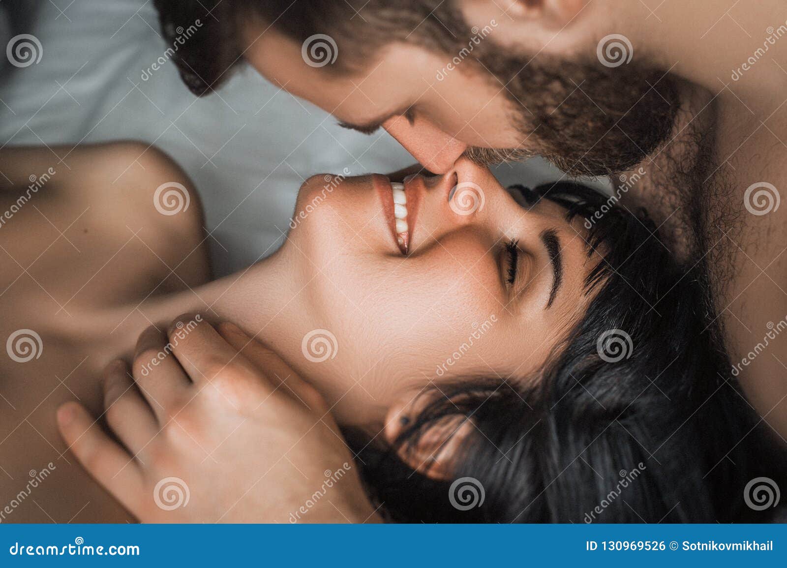 A Couple in Love Makes Love in Bed Stock Photo - Image of equality,  beautiful: 130969526