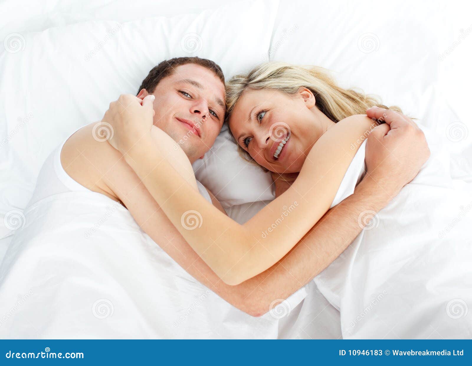 Couple Lying in Bed and Smiling at the Camera Stock Image - Image of adult, girlfriend: 10946183