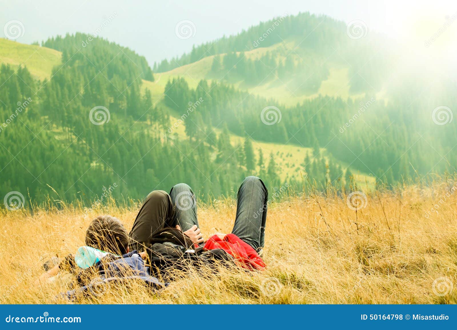 Couple Lying in on the Hills Stock Photo - Image of hiking, sport: 50164798