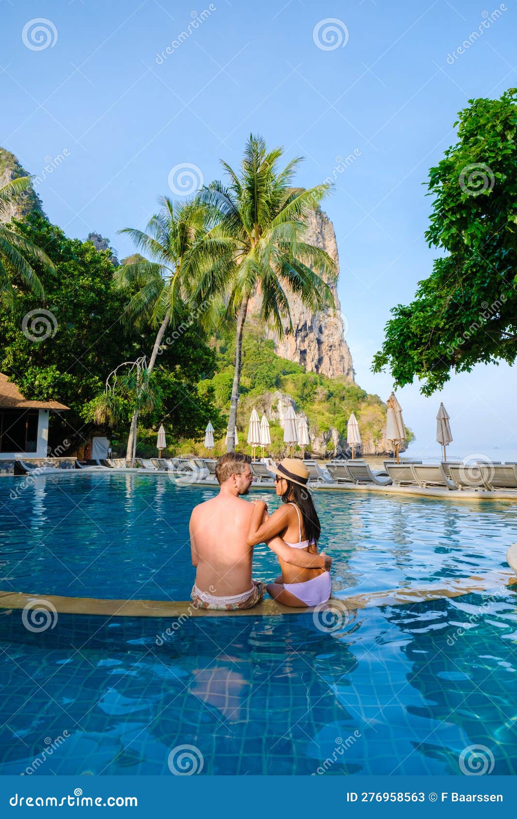 Railay Beach Krabi Thailand, a couple of men and woman on the