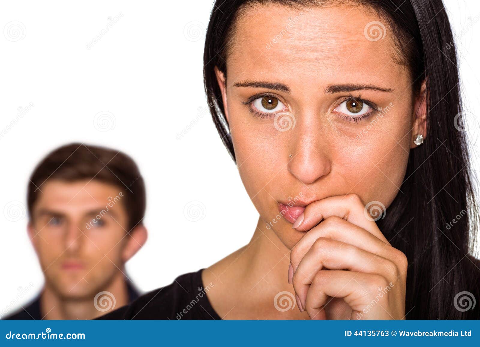Couple not talking after argument on white background