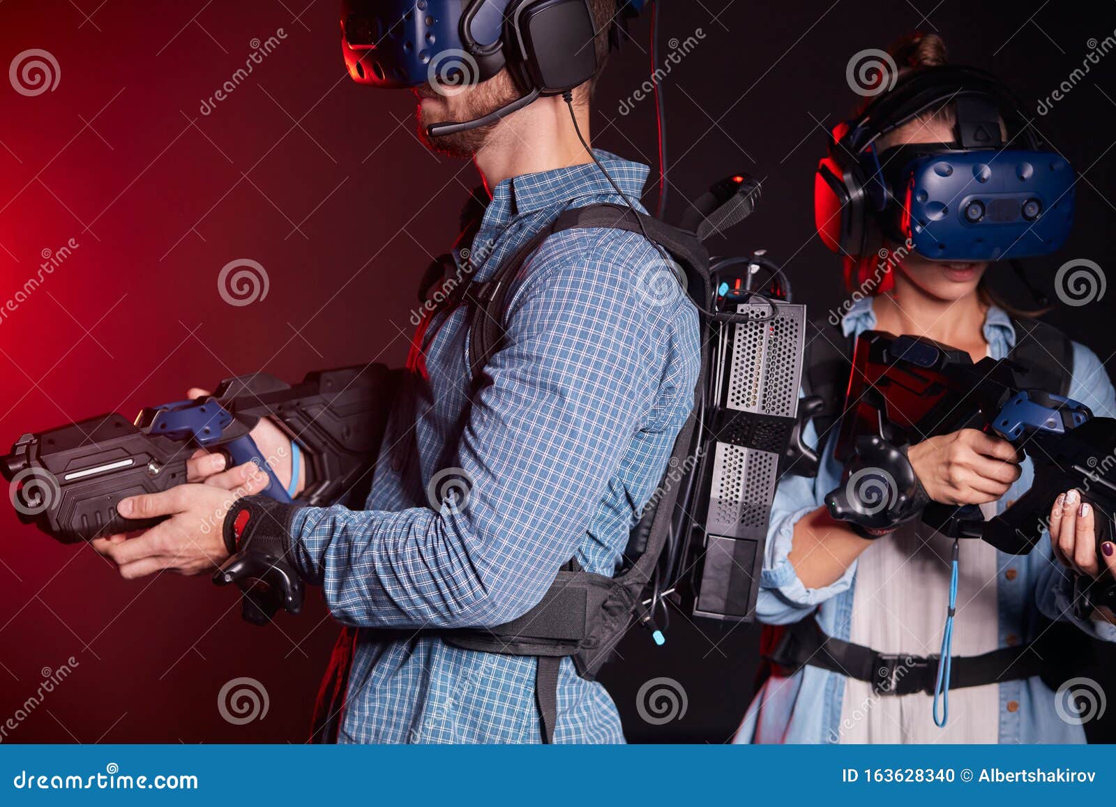 Couple Play Shooter Game with Virtual Gun and VR Glasses Photo - Image of headset, light: 163628340