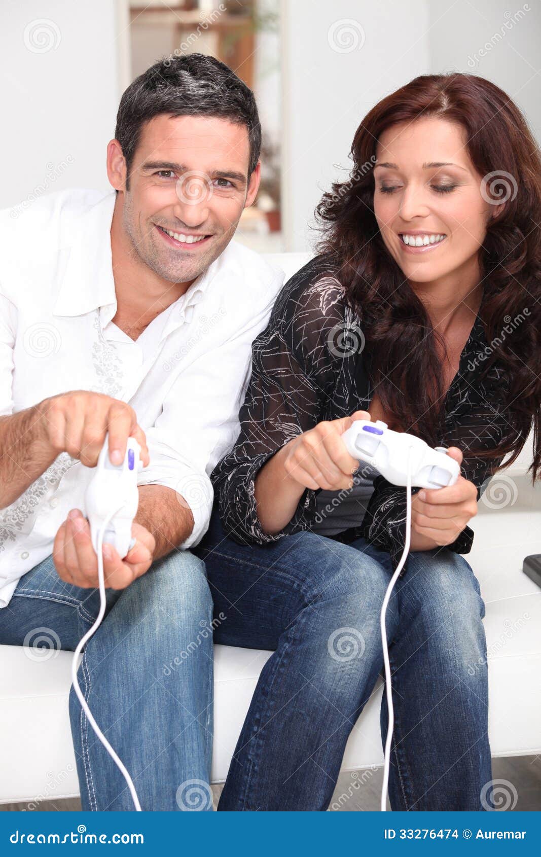 Couple Playing a Video Game Stock Photo Image of engrossed