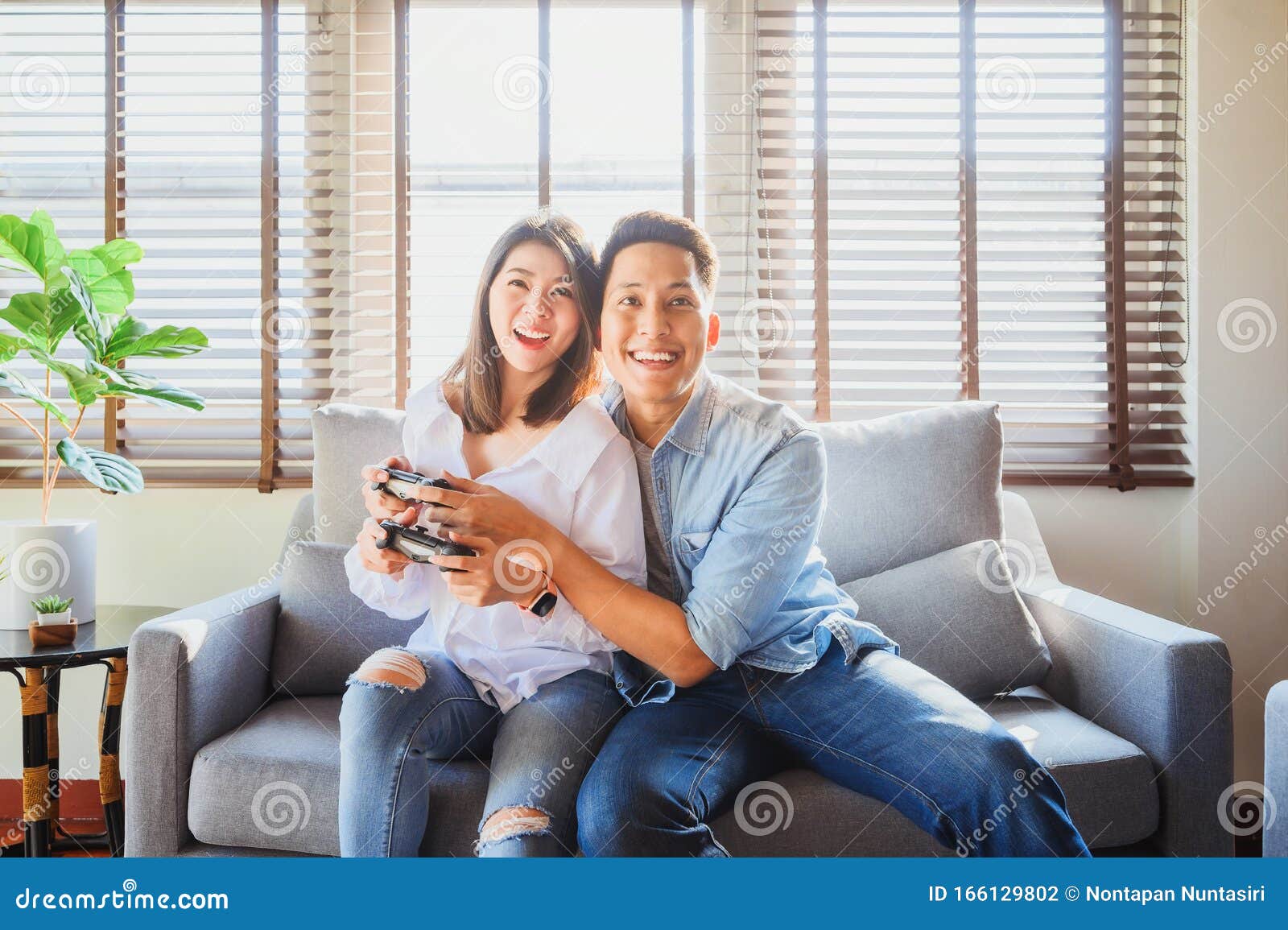 Pornography calcium A central tool that plays an important role Couple Playing Video Game Together Stock Photo - Image of controller,  excited: 166129802