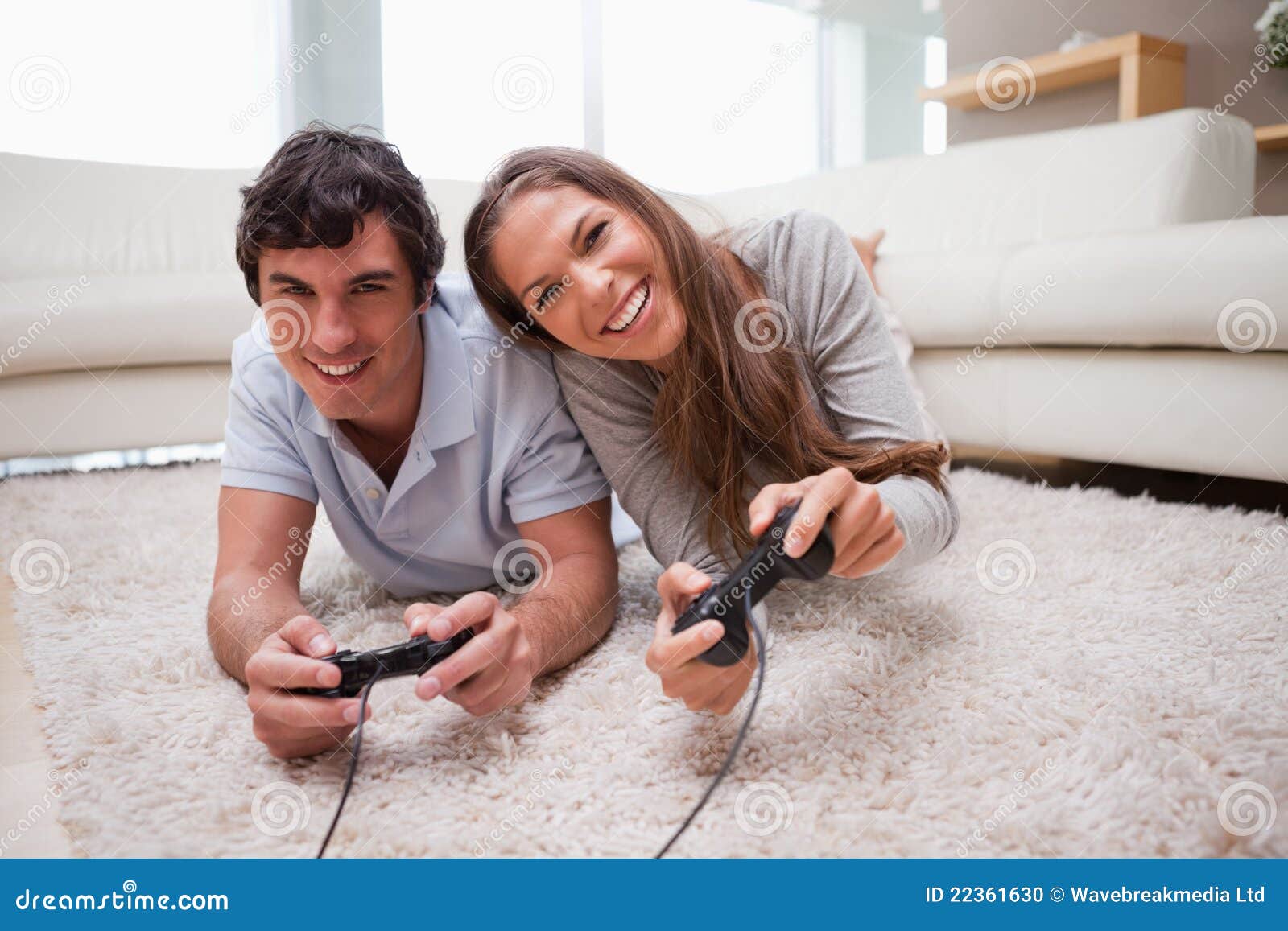 Couple Playing Video Games on the Floor Stock Photo Image of