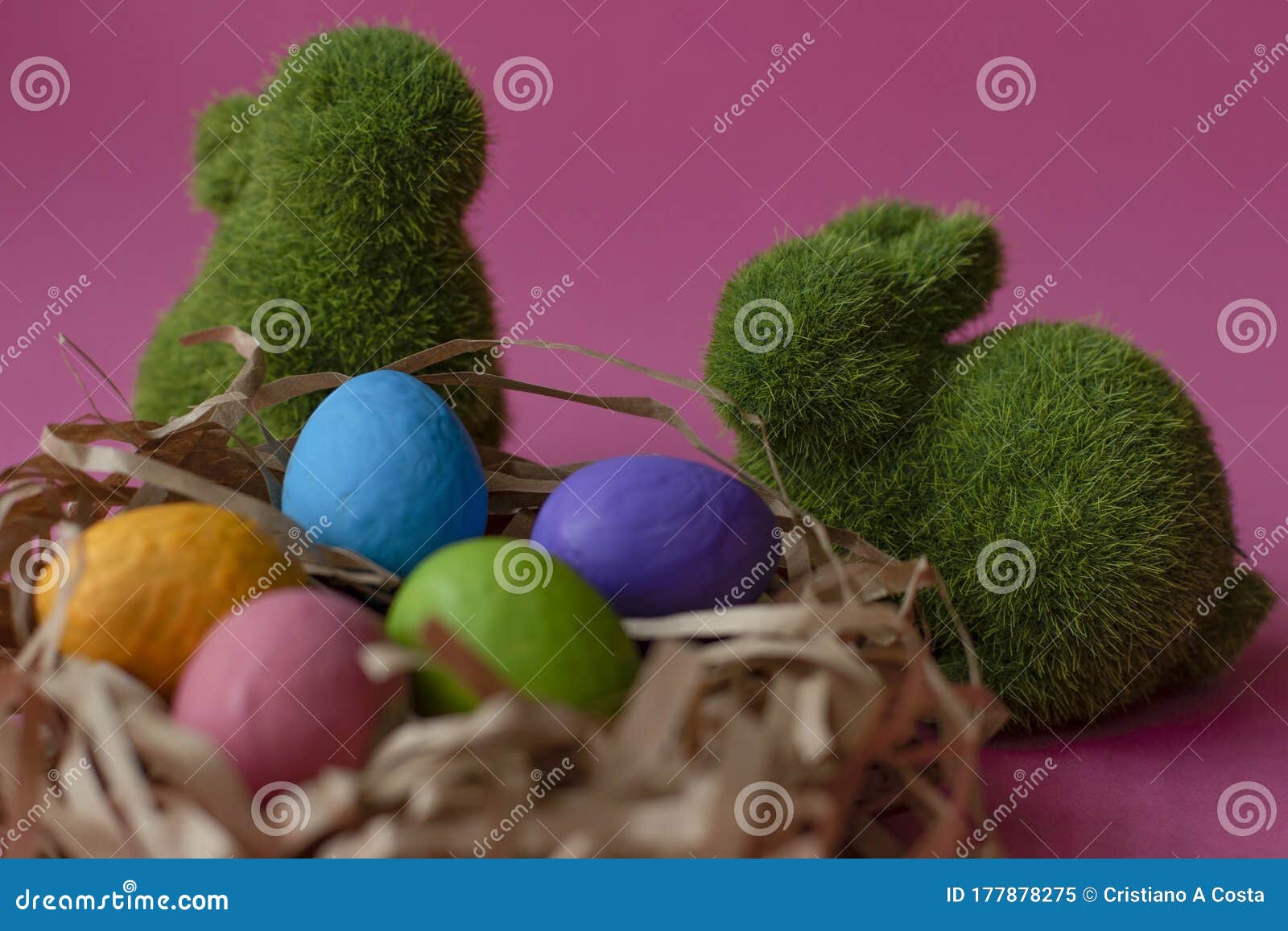 couple of rabbits and easter eggs