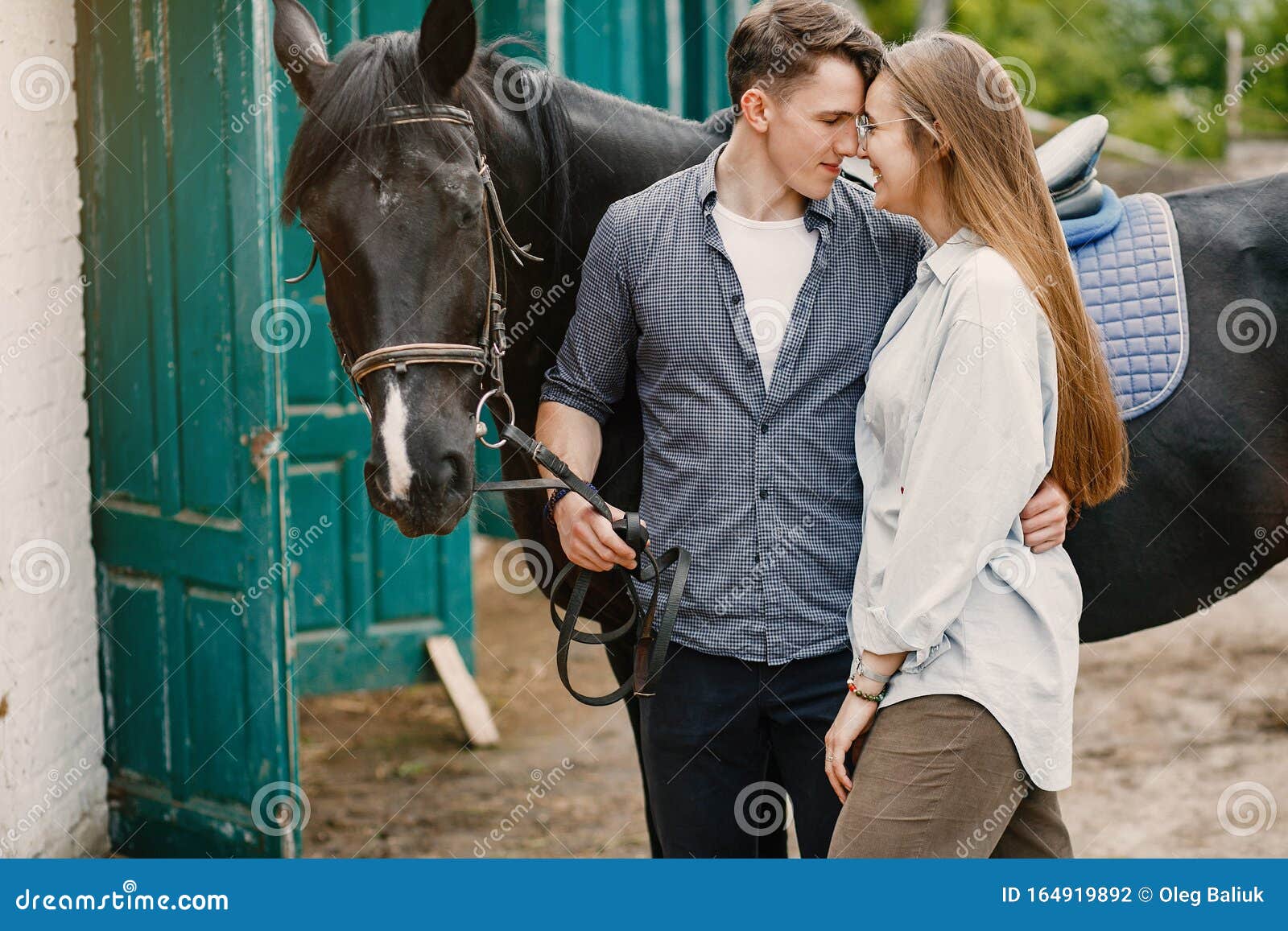 Cute Loving Couple with Horse on Ranch Stock Photo - Image of girlfriend,  black: 164919892