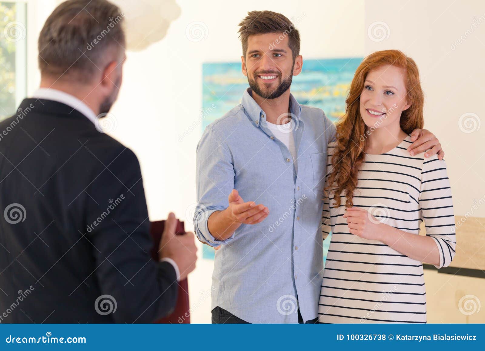 Couple in Real Estate Agency Stock Photo Image of loan, deal 100326738