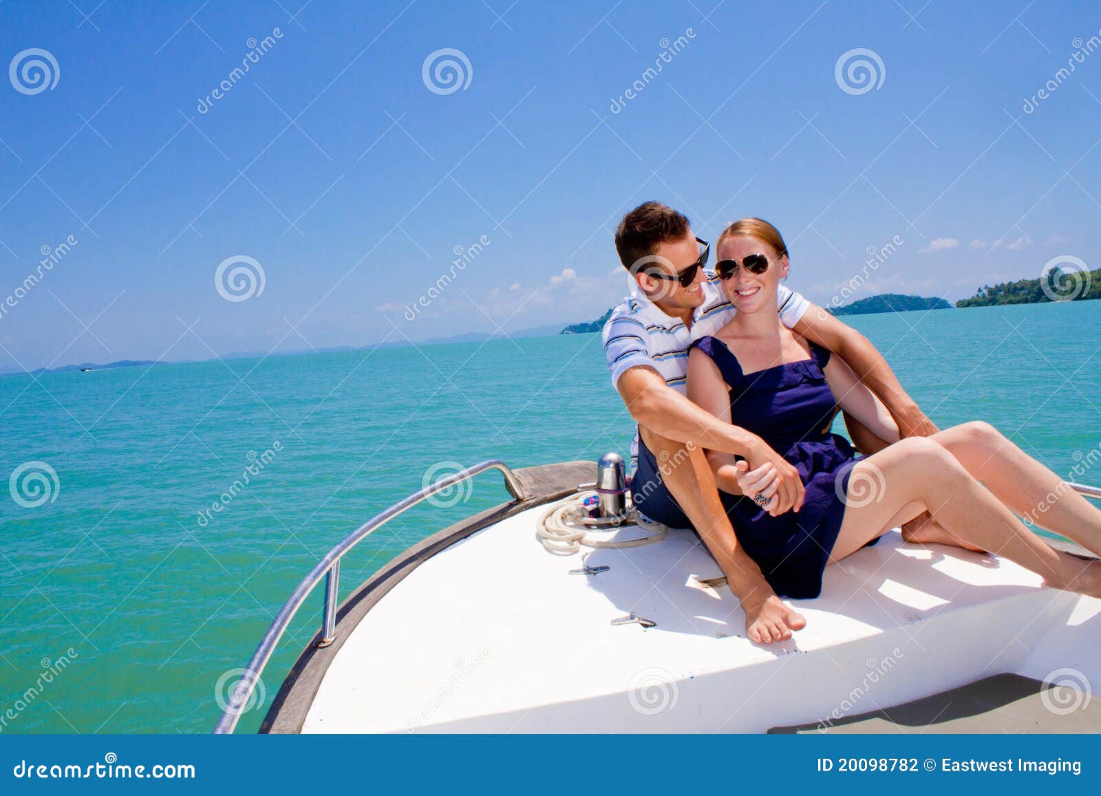 Couple Relaxing on a Boat stock photo. Image of male 20098782