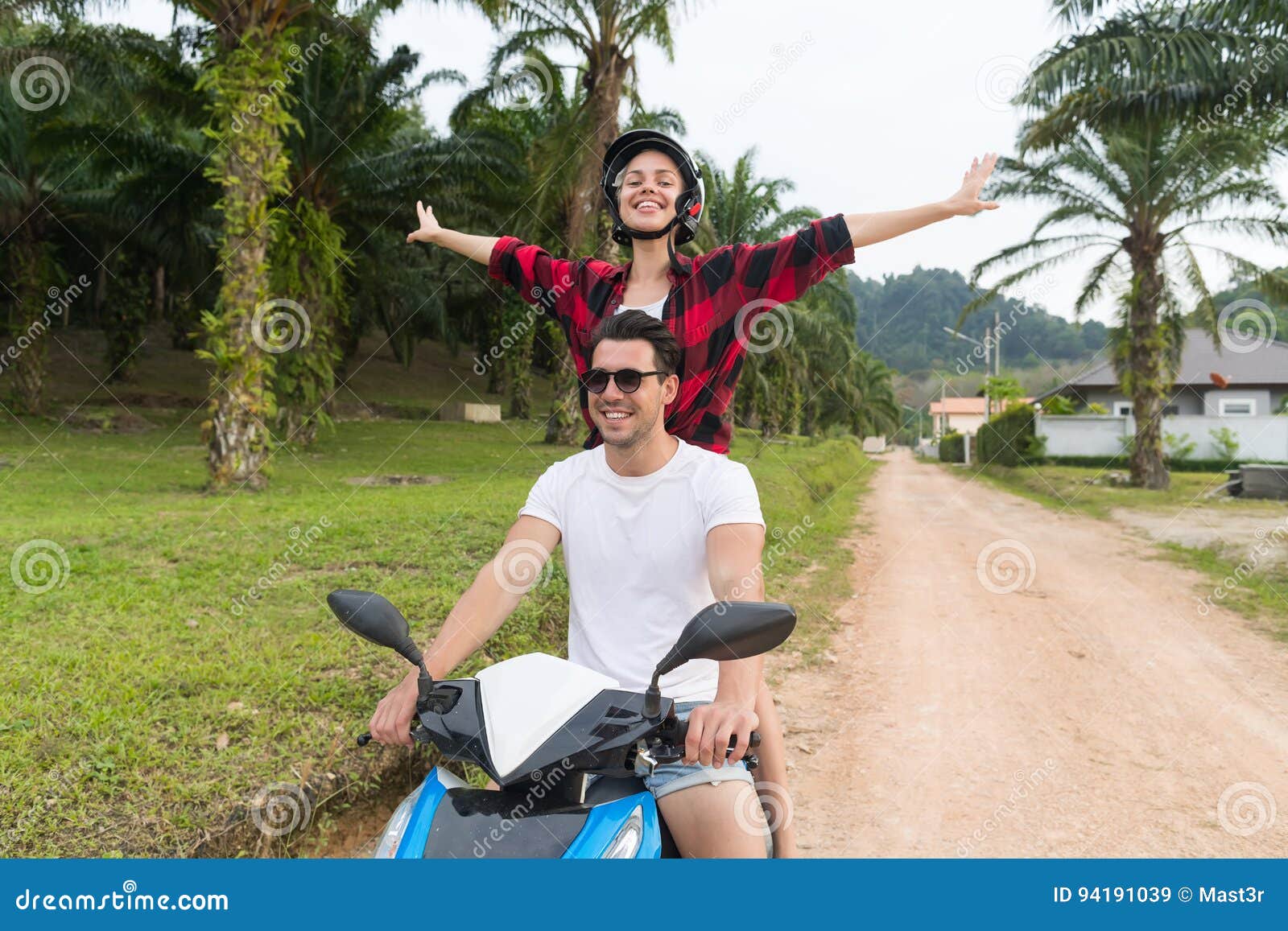 Couple posing on Royal Enfield bike - PixaHive
