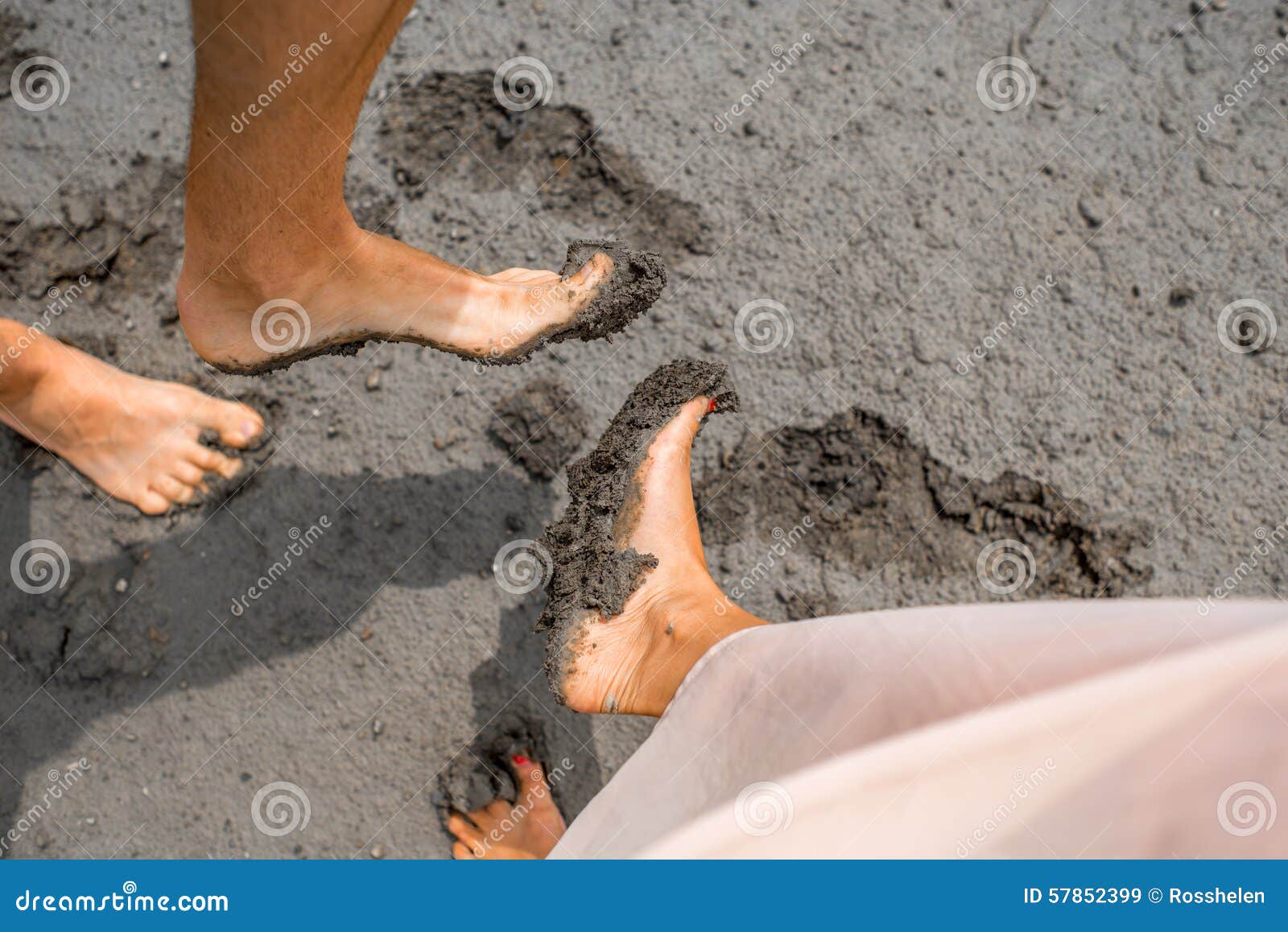 Couple s feet in the mud stock image. Image of ground 57852399