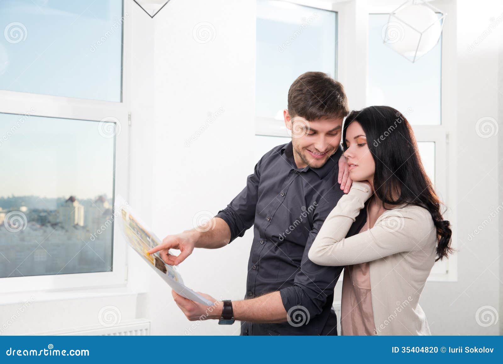 Couple in Searching the Real Estate for a Purchase Stock Photo Image