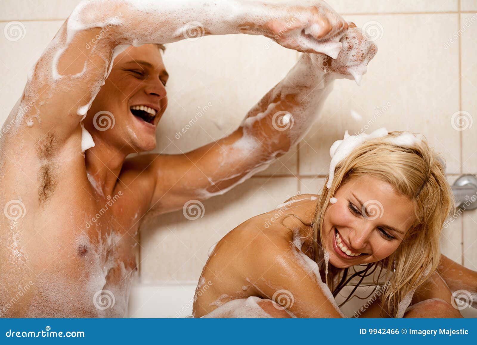 Couple sharing a bath stock photo