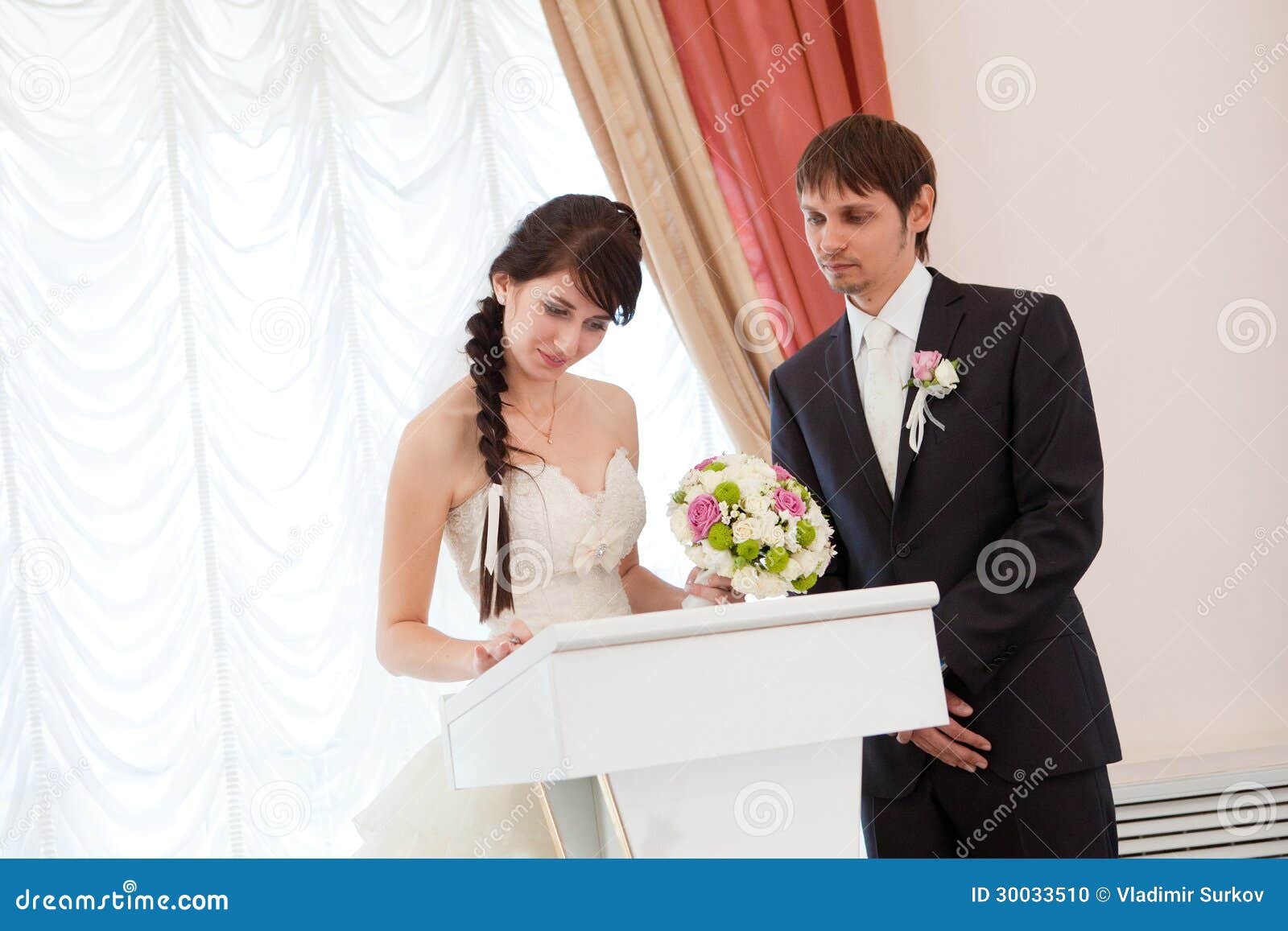 Bride and Groom Signing a Wedding Document Stock Photo Image of marriage, event 30033510