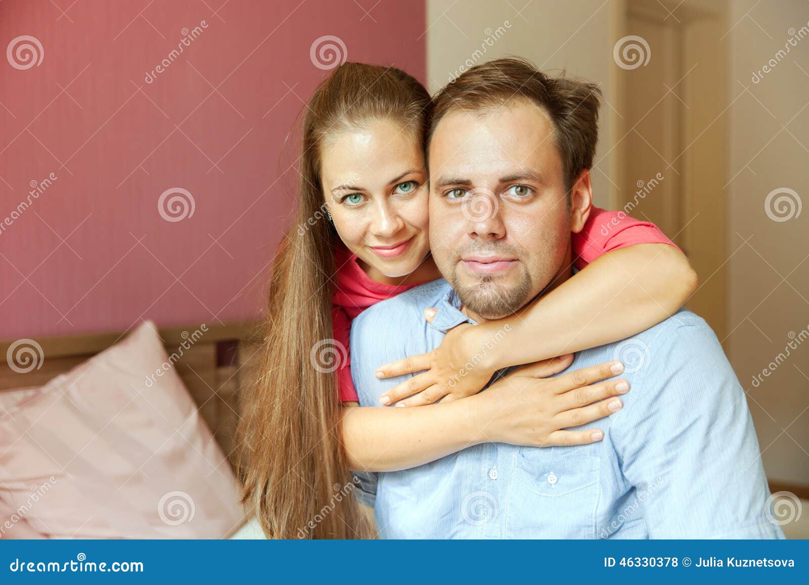 Couple sit on the bed stock photo. Image of relaxing 46330378