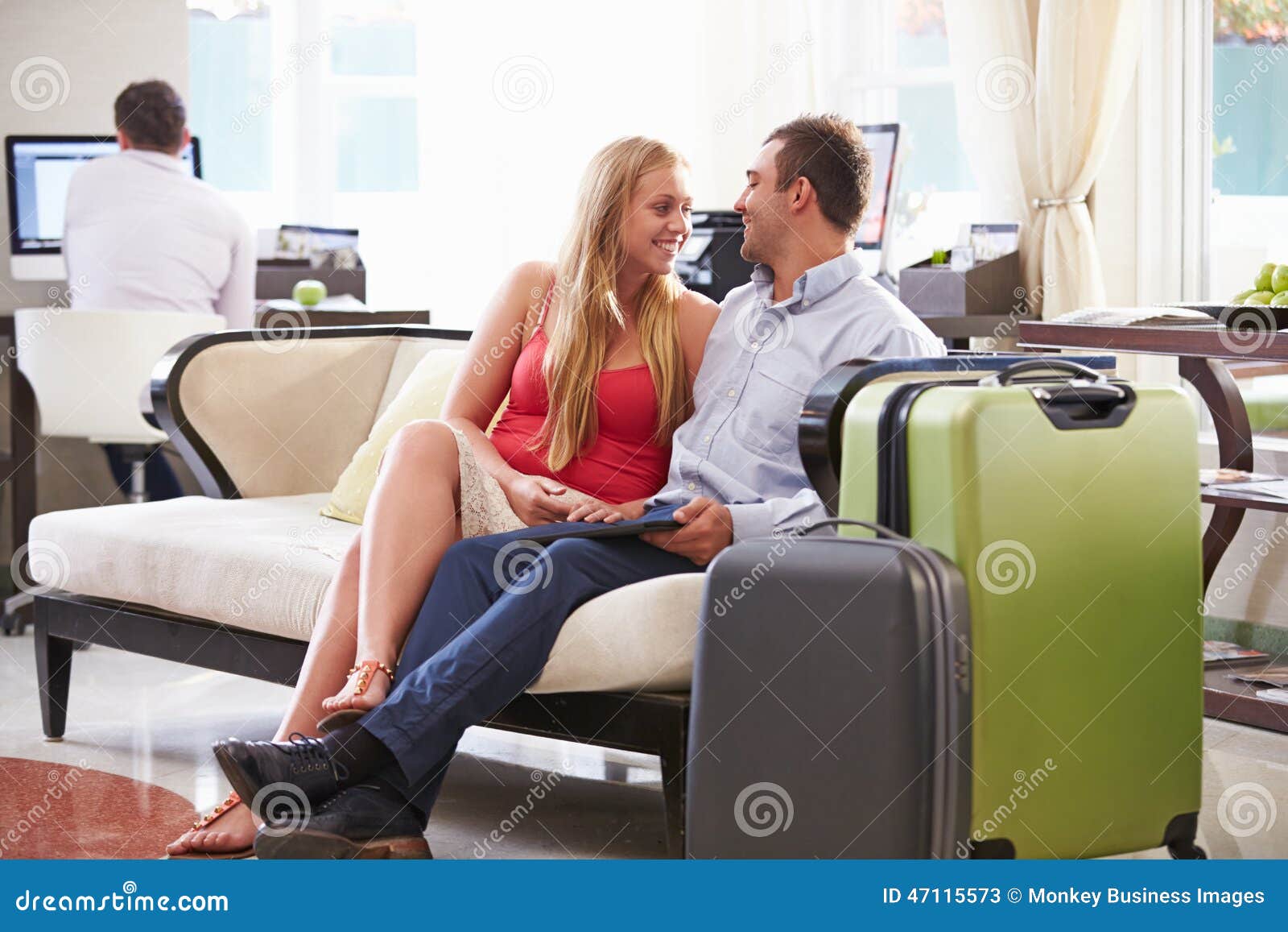 Couple Sitting In Hotel Lobby With Luggage Stock Image Image Of Vacation Luxury 47115573