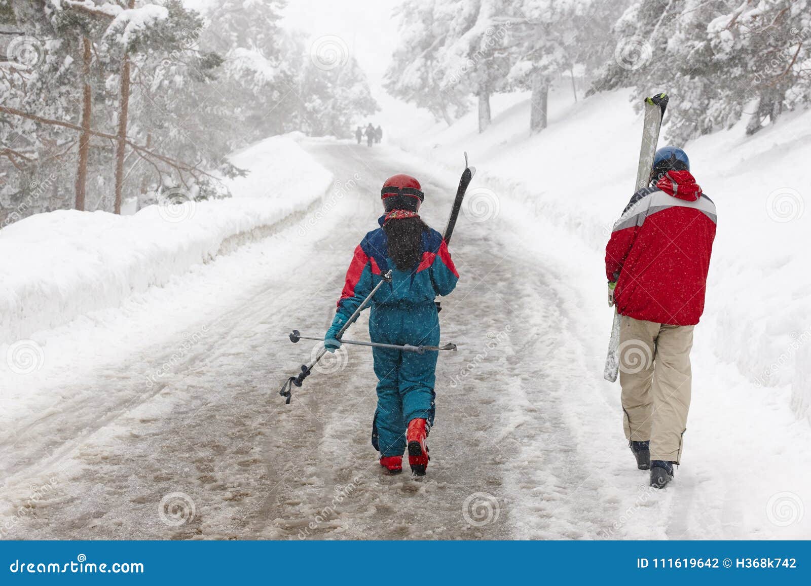 Couple of Skiers on a Snowy Pathway. Winter Sports Stock Photo - Image ...