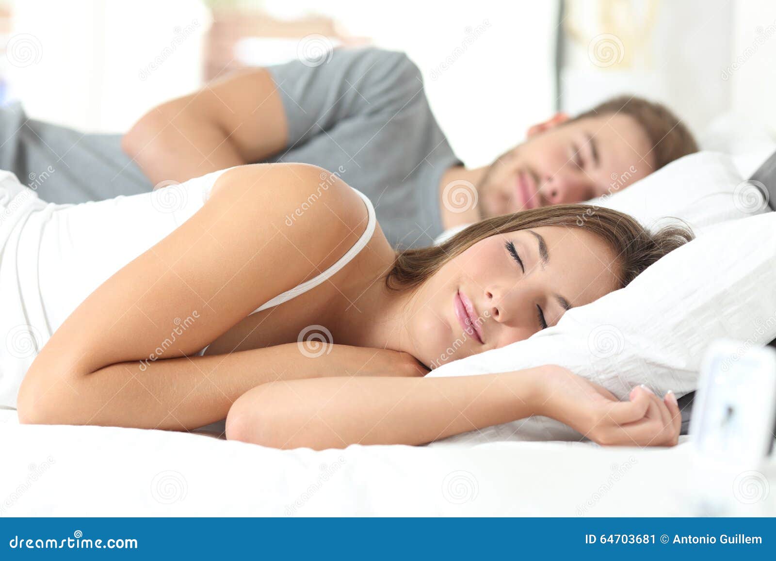 couple sleeping in a comfortable bed