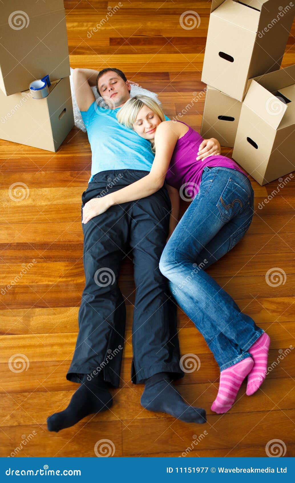 Couple Sleeping on the Floor. Moving House Stock Image Image of love