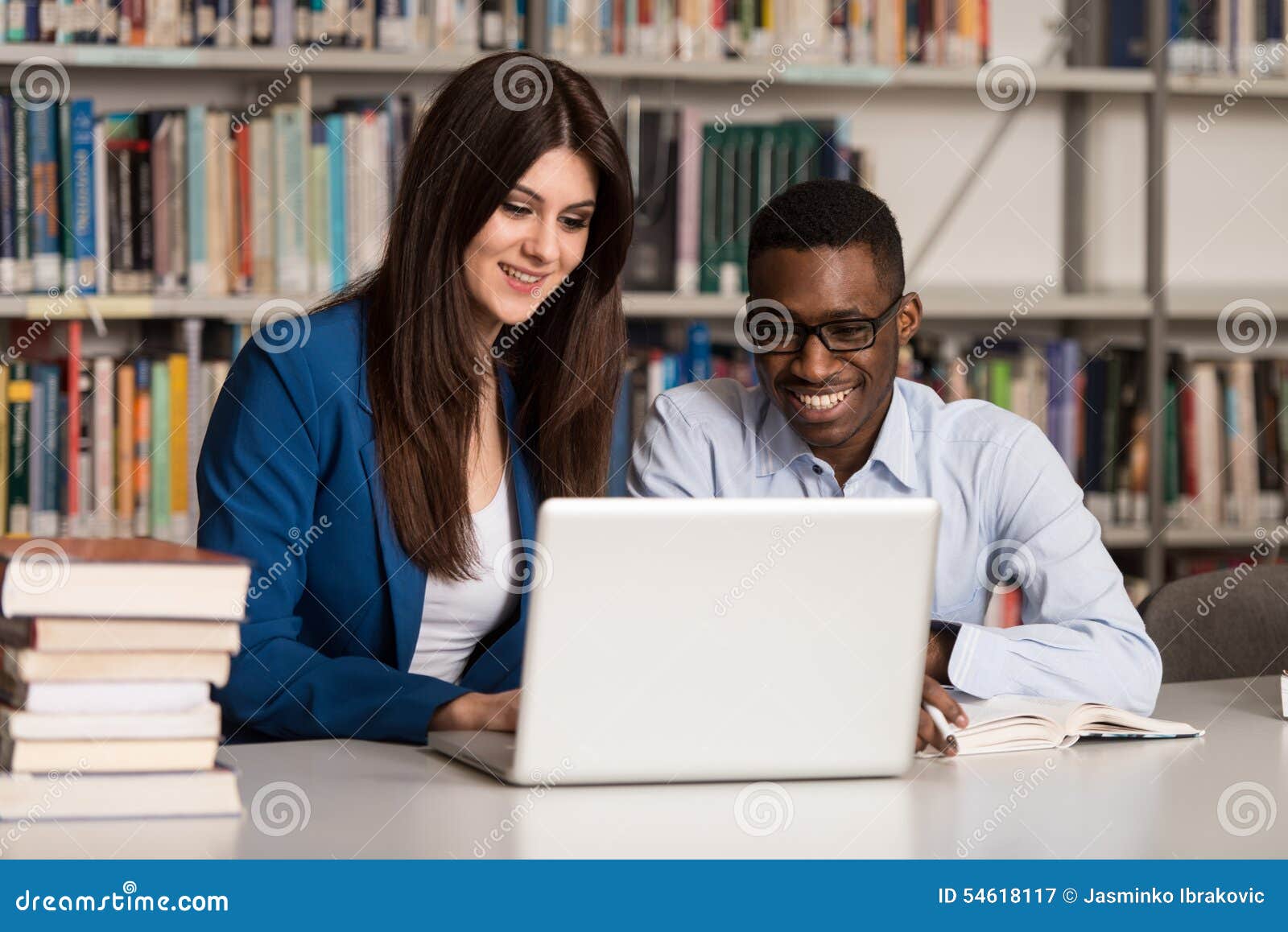 Couple Of Students With Laptop In Library Stock Image Image Of