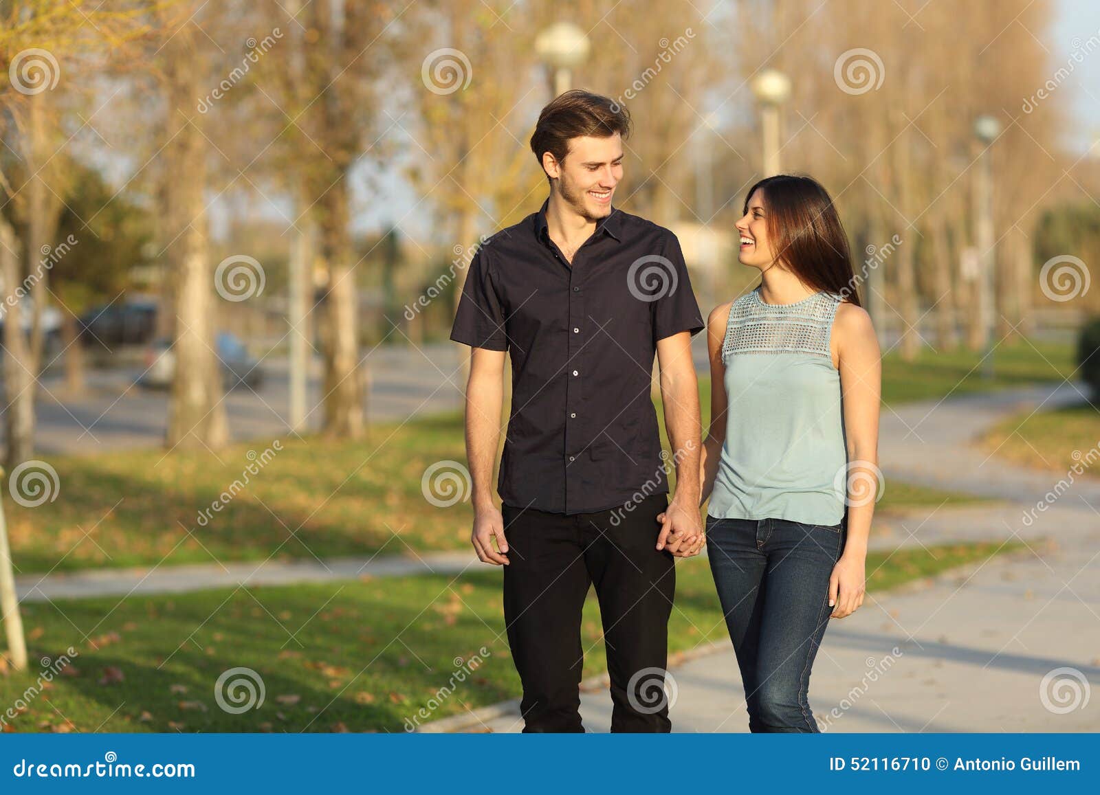 couple taking a walk in a park