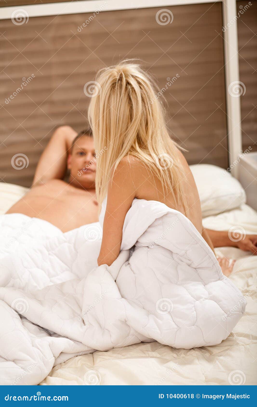 Couple talking after sex stock photo