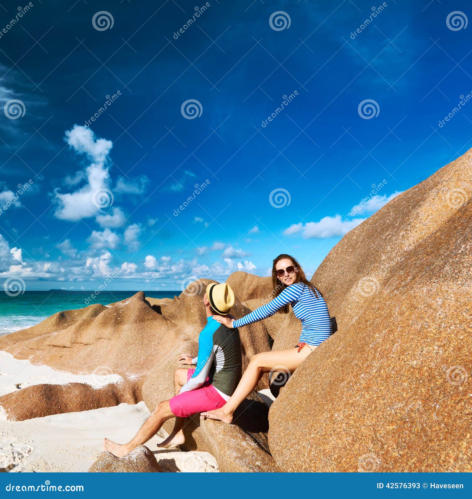 Couple at Tropical Beach Wearing Rash Guard Stock Image Image of lifestyles, summer 42576393