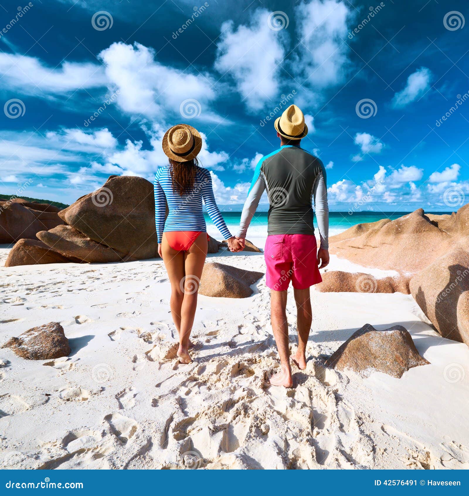 Couple at Tropical Beach Wearing Rash Guard Stock Image Image of relaxation, argent 42576491