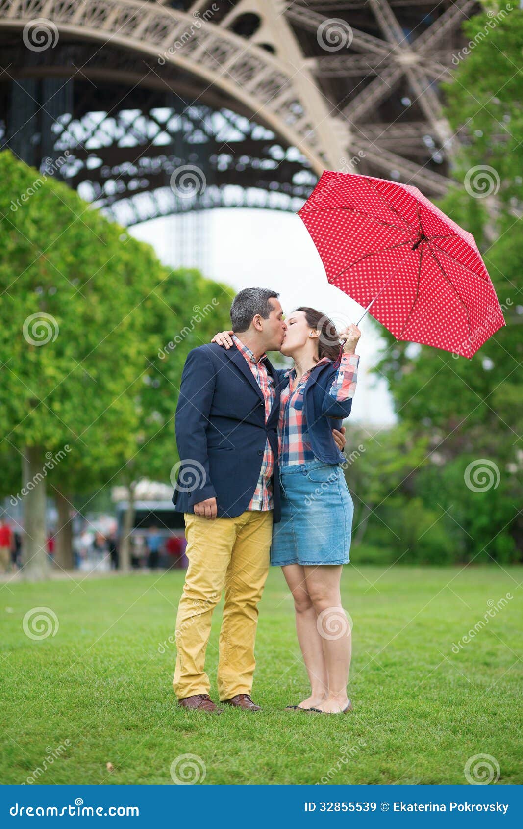 Couple with Umbrella Under the Eiffel Tower Stock Image Image of