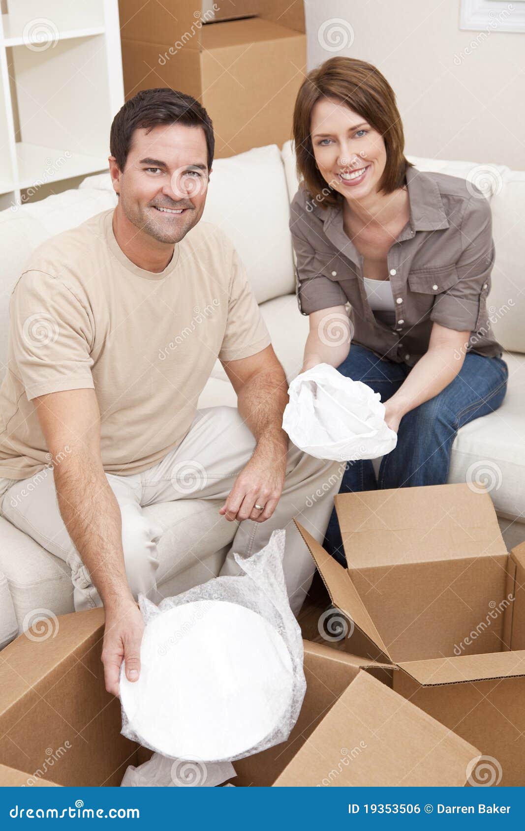 Couple Unpacking or Packing Boxes Moving House Stock Photo Image of